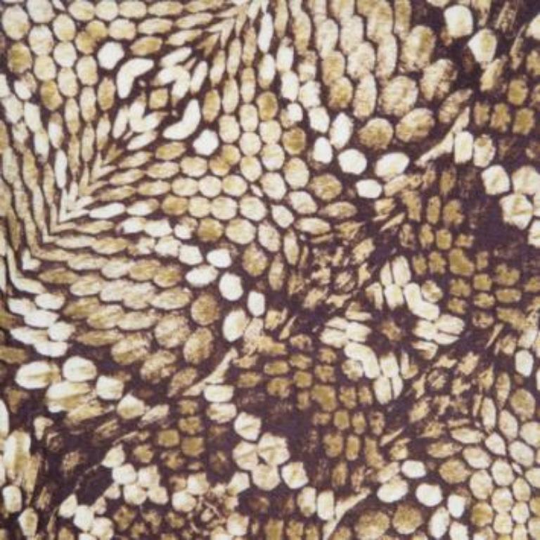 Votre recherche d'un haut simple et sophistiqué s'achève avec cet adorable modèle de Just Cavalli. Ce haut marron est réalisé en viscose mélangée et présente des manches longues ainsi qu'un fabuleux imprimé animalier sur toute sa surface. Vous