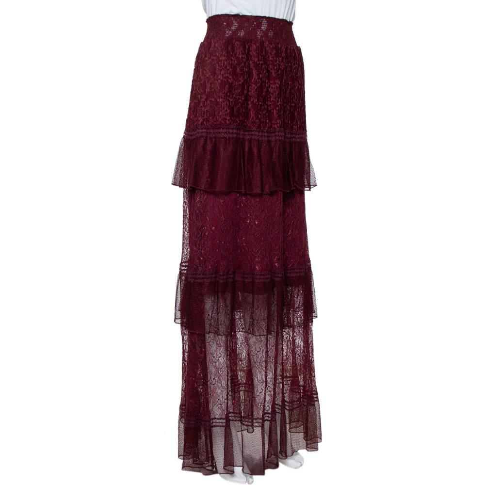This Just Cavalli lace maxi skirt is meant to elevate your style, be it casual or evening. It has a comfortable waistline and an ankle-length hemline falling with dreamy tiered panels. Style it with an elegant blouse and slingbacks.