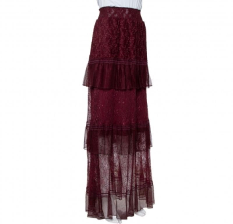 This Just Cavalli lace maxi skirt is meant to elevate your style, be it casual or evening. It has a comfortable waistline and an ankle-length hemline falling with dreamy tiered panels. Style it with an elegant blouse and slingbacks.