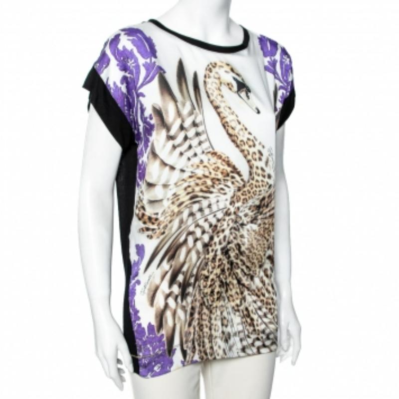 This top from Just Cavalli surely will bring color and fun to your casual style! It is stitched meticulously using multicolored printed silk fabric. Make a chic fashion statement as you wear this Just Cavalli top!