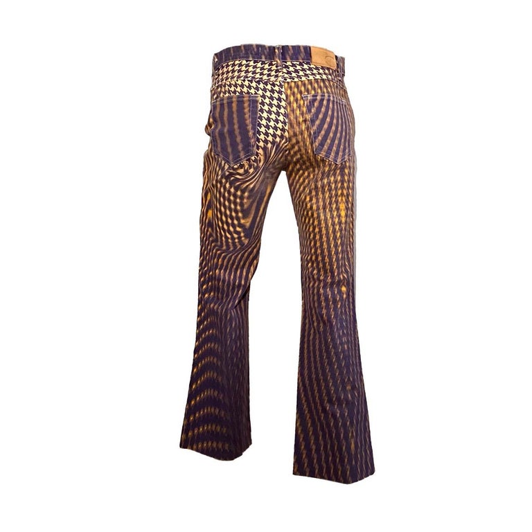 2000s Just Cavalli flared Jeans with abstract Yellow/Purple psychedelic print.

Size US 30 IT 44

Measurements:

Waistline - 74 cm / 29,1 inches
Inseam - 73 cm / 28,7 inches
Outseam - 96 cm / 37,7 inches
Leg Opening - 47 cm / 18,5 inches 