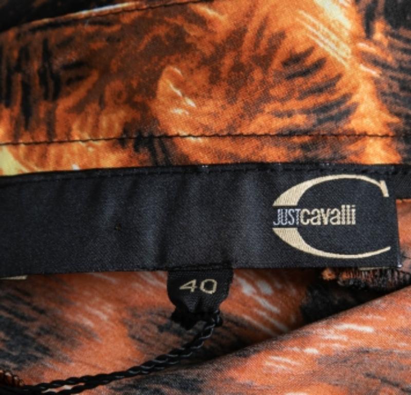 Just Cavalli Gonna con orlo svasato stampata arancione e nera S In condizioni buone in vendita a Dubai, Al Qouz 2
