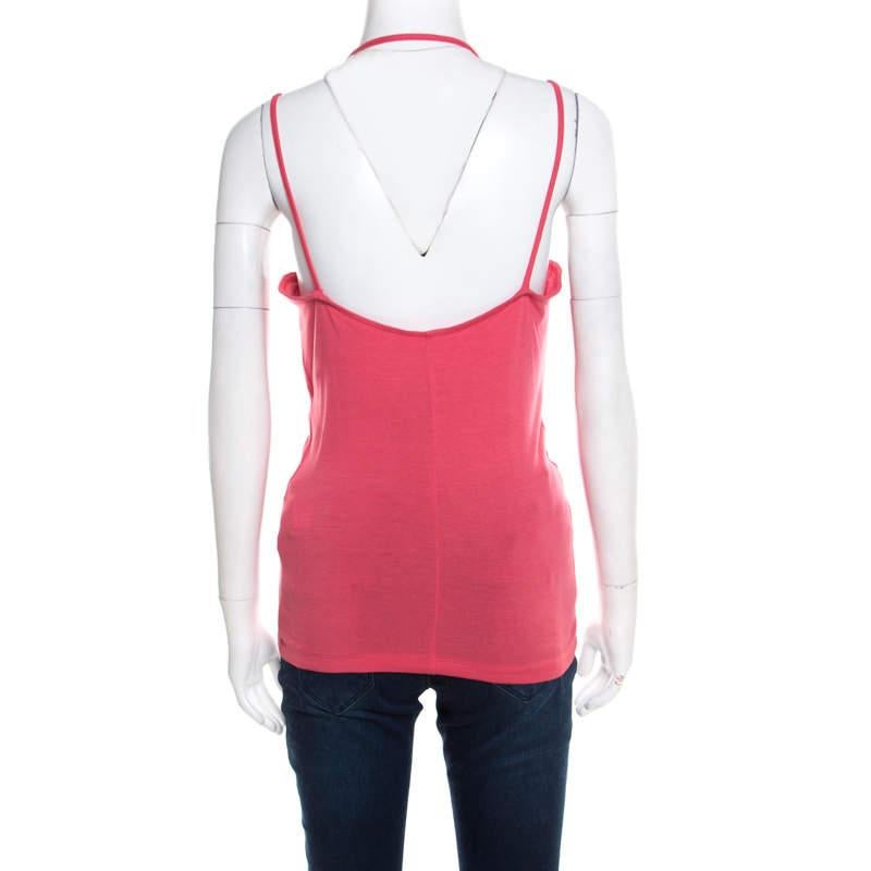 This pink tank top from Just Cavalli features a metallic print on the front. It flaunts a deep back and is sure to lend you a great fit. Pair it with jeans or trousers for your casual outing with friends.

