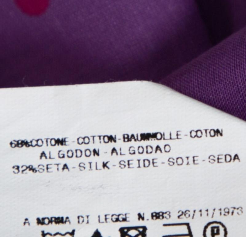 Include this stylish blouse from Just Cavalli in your closet to introduce a chic piece into your formal ensemble. Tailored in a blend of cotton and silk, this lovely purple blouse carries a collar, a buttoned front and short sleeves. This one will