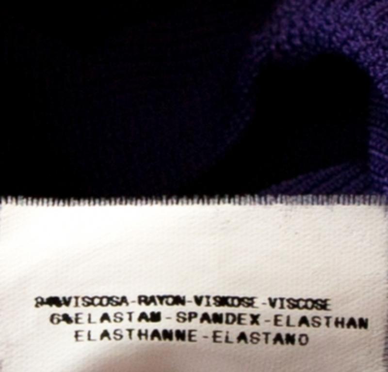 This purple dress is from the house of Just Cavalli. This dress wins with its feminine design of plunging neckline, well-designed rear and a fitted silhouette. It is sleeveless and has a short hem.