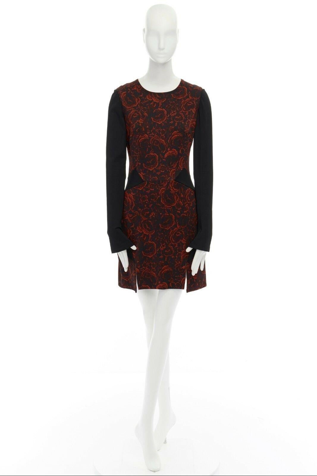 JUST CAVALLI red floral print black panelled dual slit bodycon cocktail dress S Reference: MYSD/A00015 
Brand: Just Cavalli 
Designer: Roberto Cavalli 
Material: Viscose 
Color: Red 
Pattern: Floral 
Closure: Zip 
Extra Detail: Viscose, elastane.