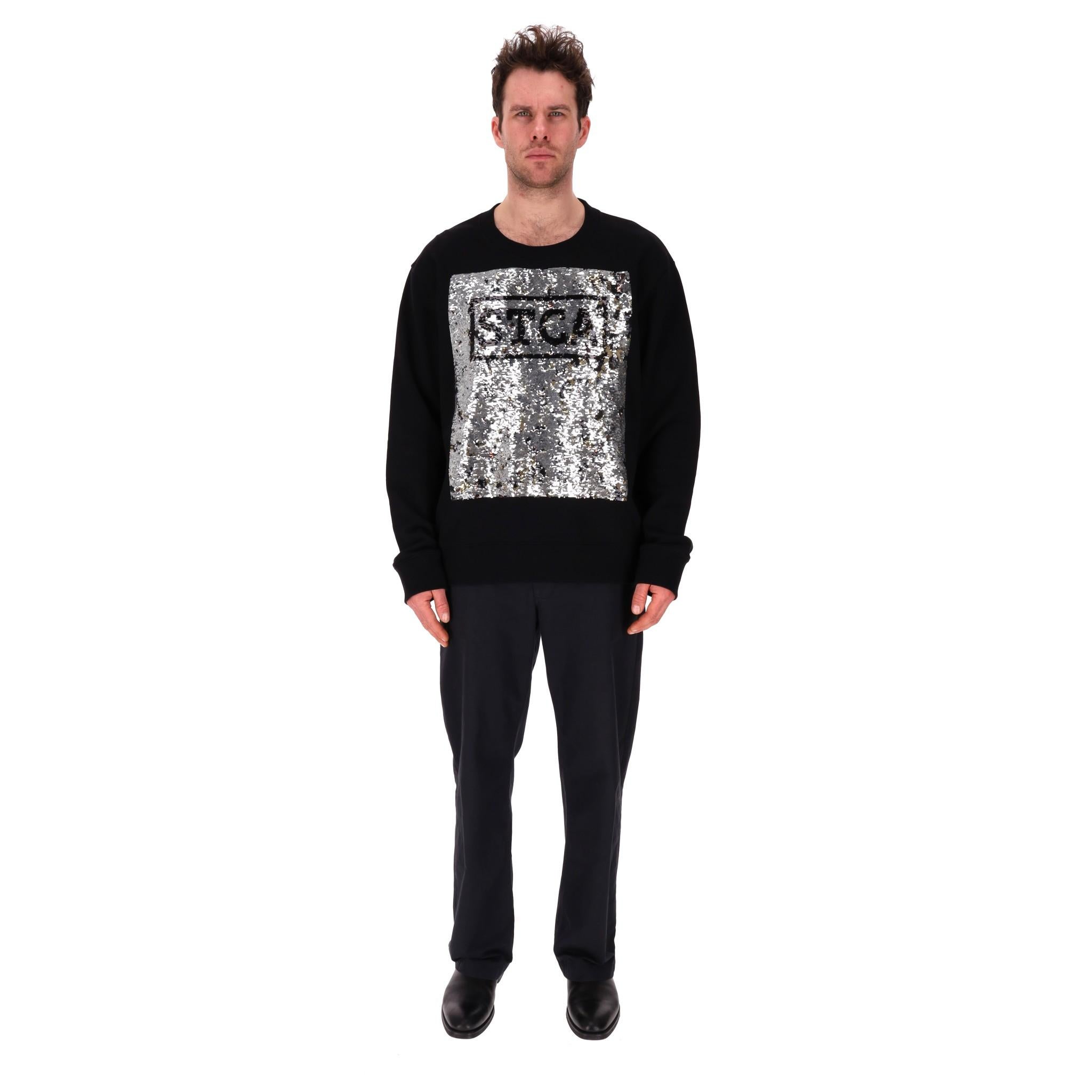 Just Cavalli Reversible Sequin Embroidery Sweatshirt

Black, cotton sweatshirt designed with reversible sequin embroidery to the front.

Gold, leopard pattern to one side and silver with 'STCA' wording to the other.

Featuring long sleeves, crew