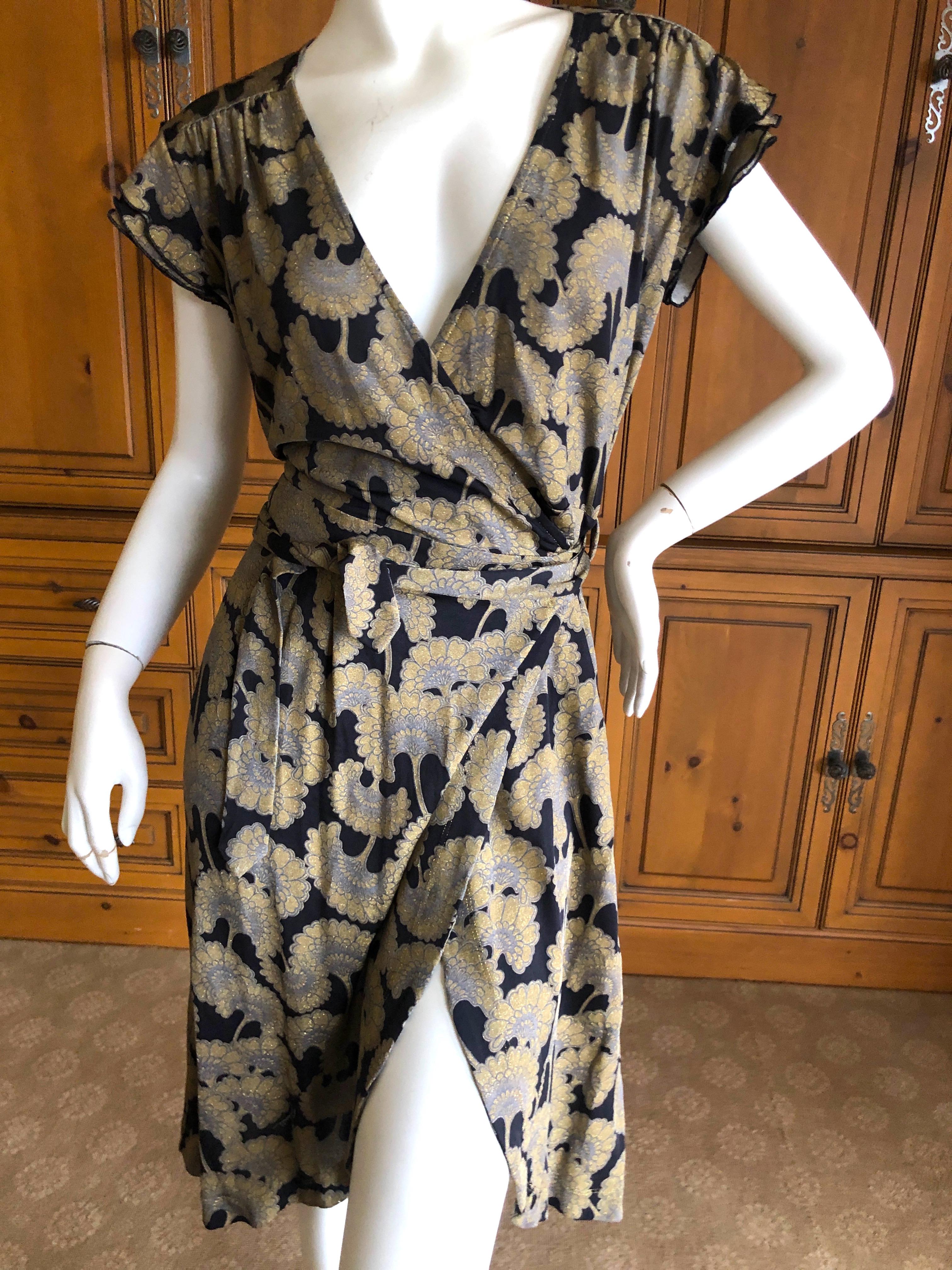 Just Cavalli Roberto Cavalli Sweet Golden Japanese Ginko Leaf Print Mini Dress.
New with tags
This is so pretty, the photos don't do it justice. 
Size 42 There is a lot of stretch
Bust 38