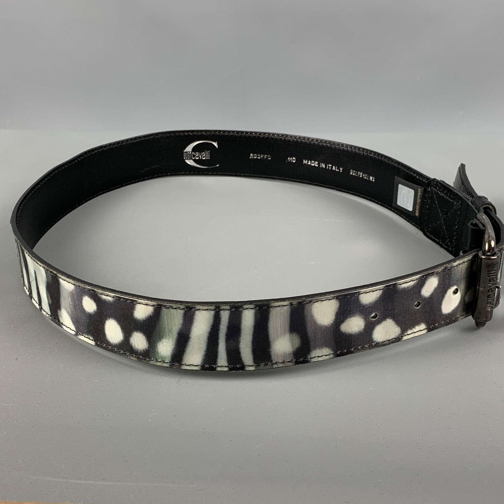 JUST CAVALLI
 belt comes in a black and white zebra leather and acetate featuring a dark metal tone buckle. Made in Italy.Very Good Pre- Owned Conditions. 

Marked:   90/PB10/WXLength: 37.5 inches Width: 1.5 inches Fits: 29 inches  - 35 inches