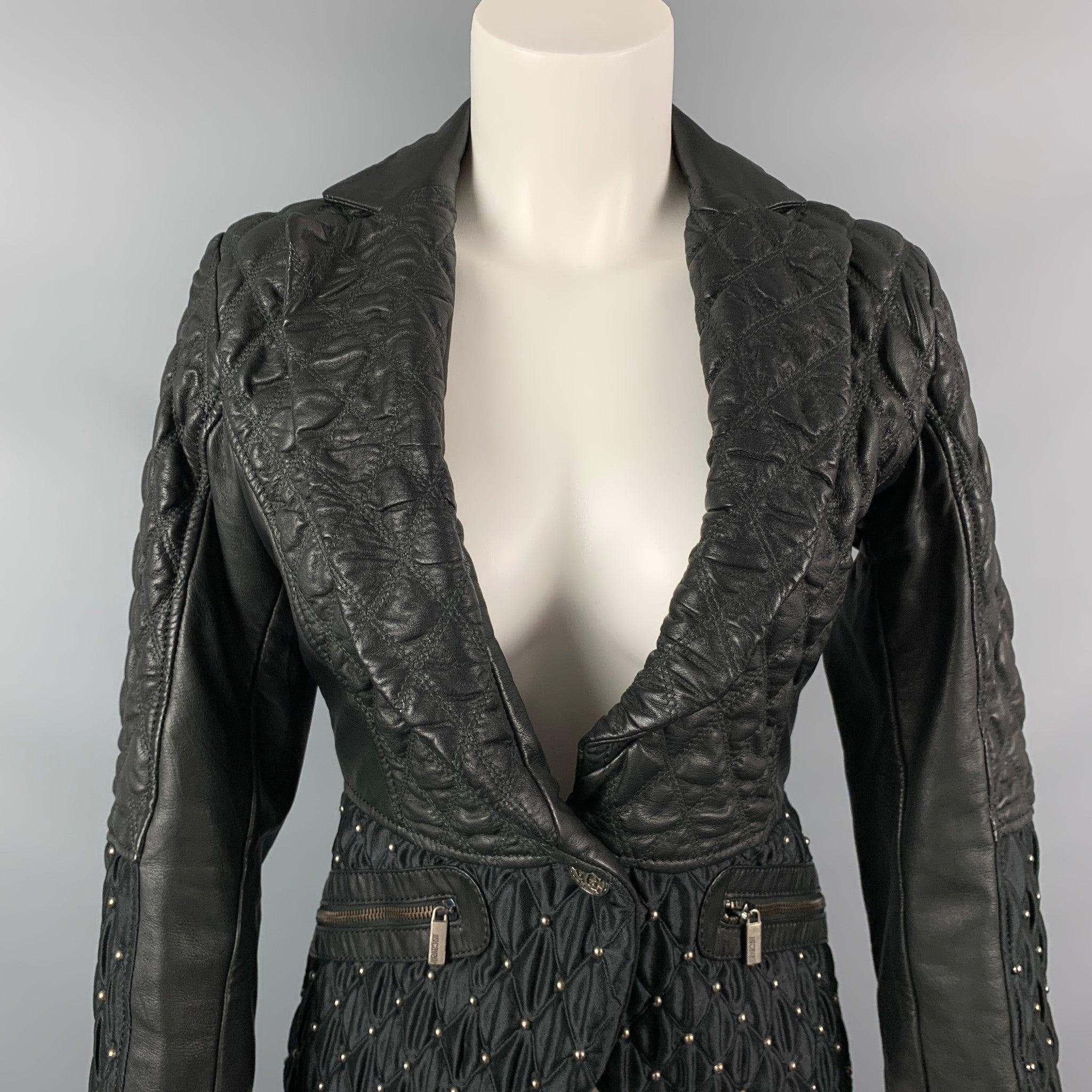JUST CAVALLI jacket comes in a black quilted acetate / viscose with a full liner featuring a shawl collar, studded details, a-line, zipper pockets, and a single button closure.
Very Good
Pre-Owned Condition. 

Marked:   40 

Measurements: 
