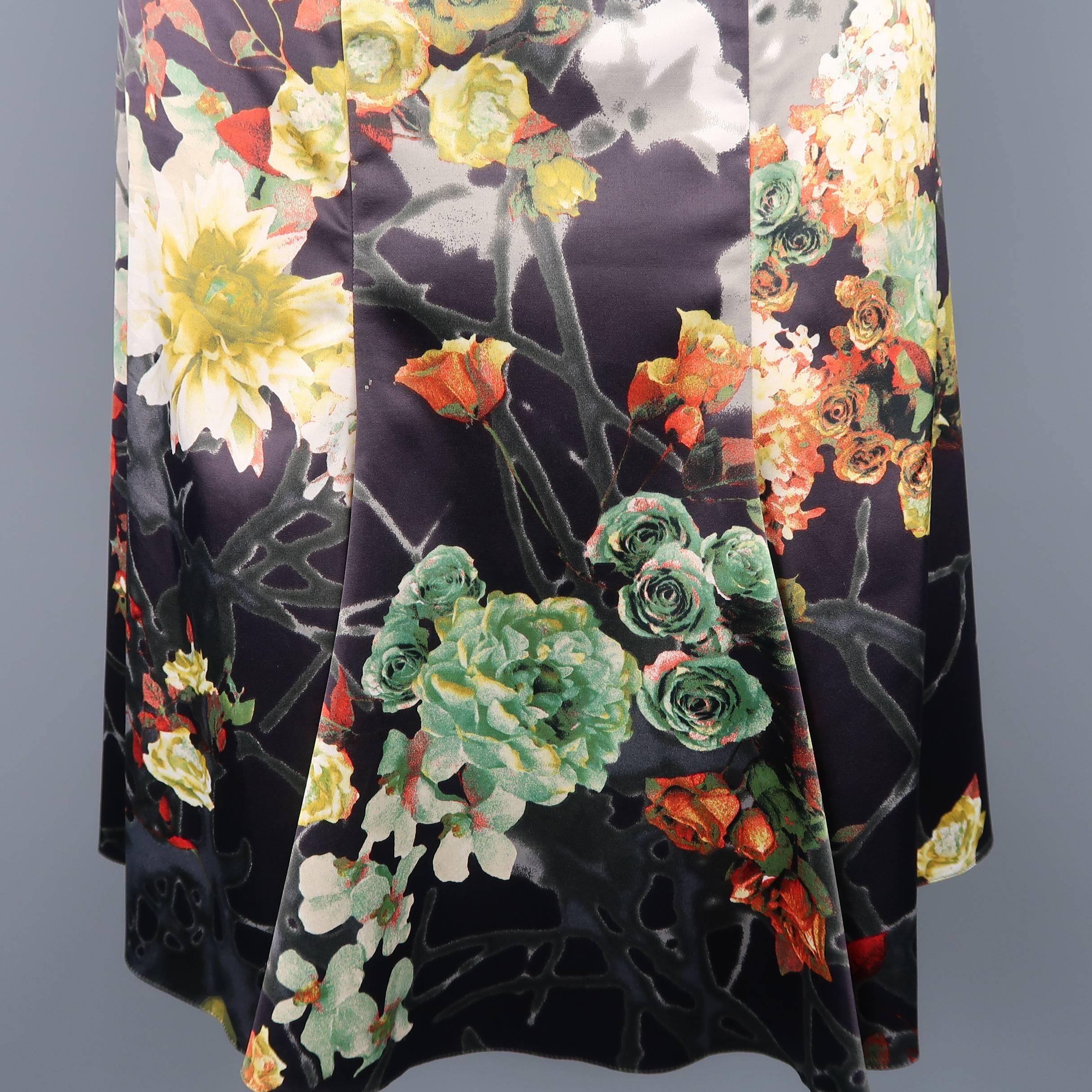 JUST CAVALLI flare skirt comes in a charcoal abstract floral print satin twill material with hues of chartreuse, mint green,  and orange red with a ruffled hemline. Tags removed. As-is. Made in Italy.
 
Good Pre-Owned Condition.
Marked: (no tag)
