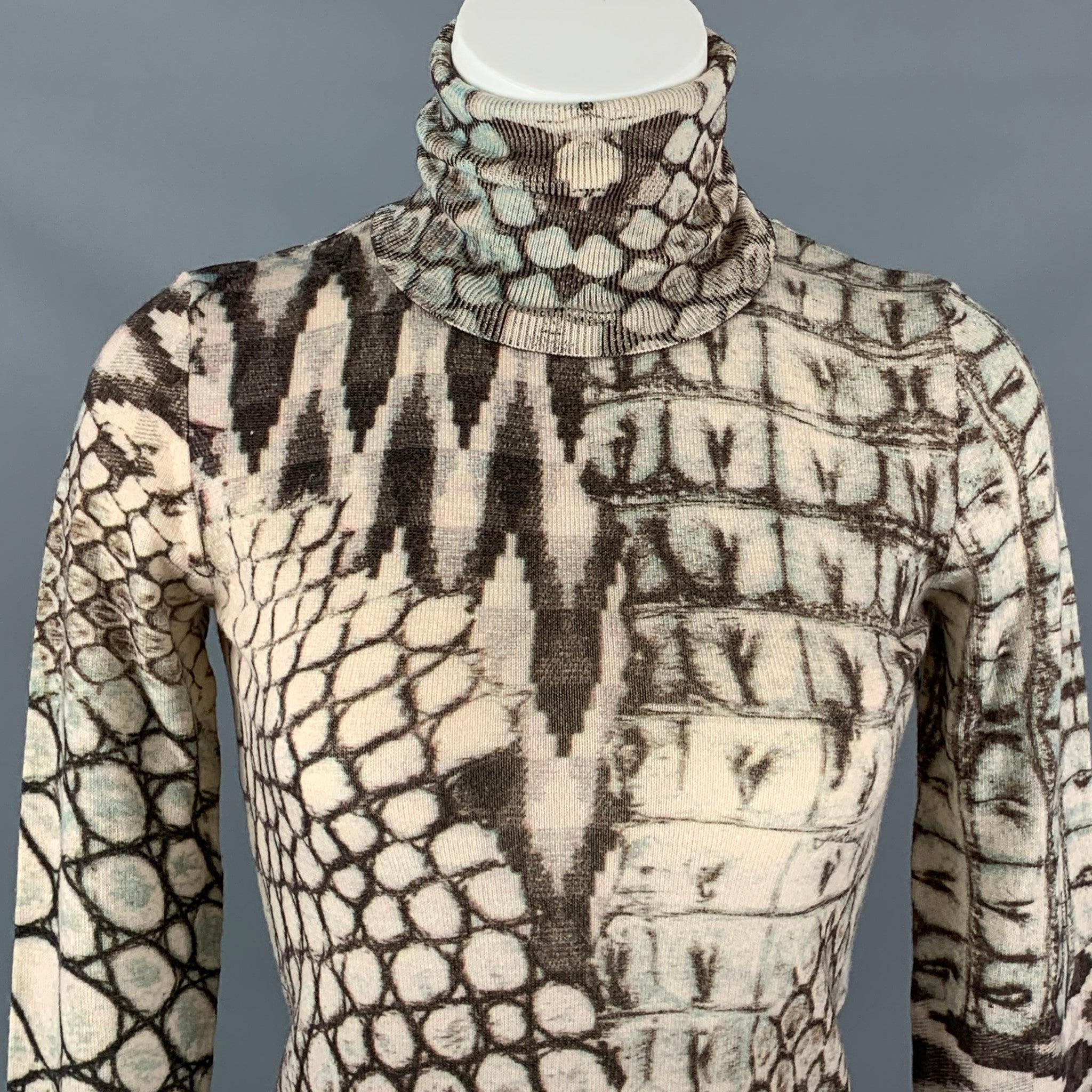 JUST CAVALLI pullover sweater comes in a cream and taupe snake print
  wool featuring DETAIL, a turtleneck long sleeves. Made in Italy. Excellent Pre-Owned Condition.  
 

 Marked:  40 
 

 Measurements: 
  
 Shoulder:
 15 inBust: 30 inSleeve: 26.5