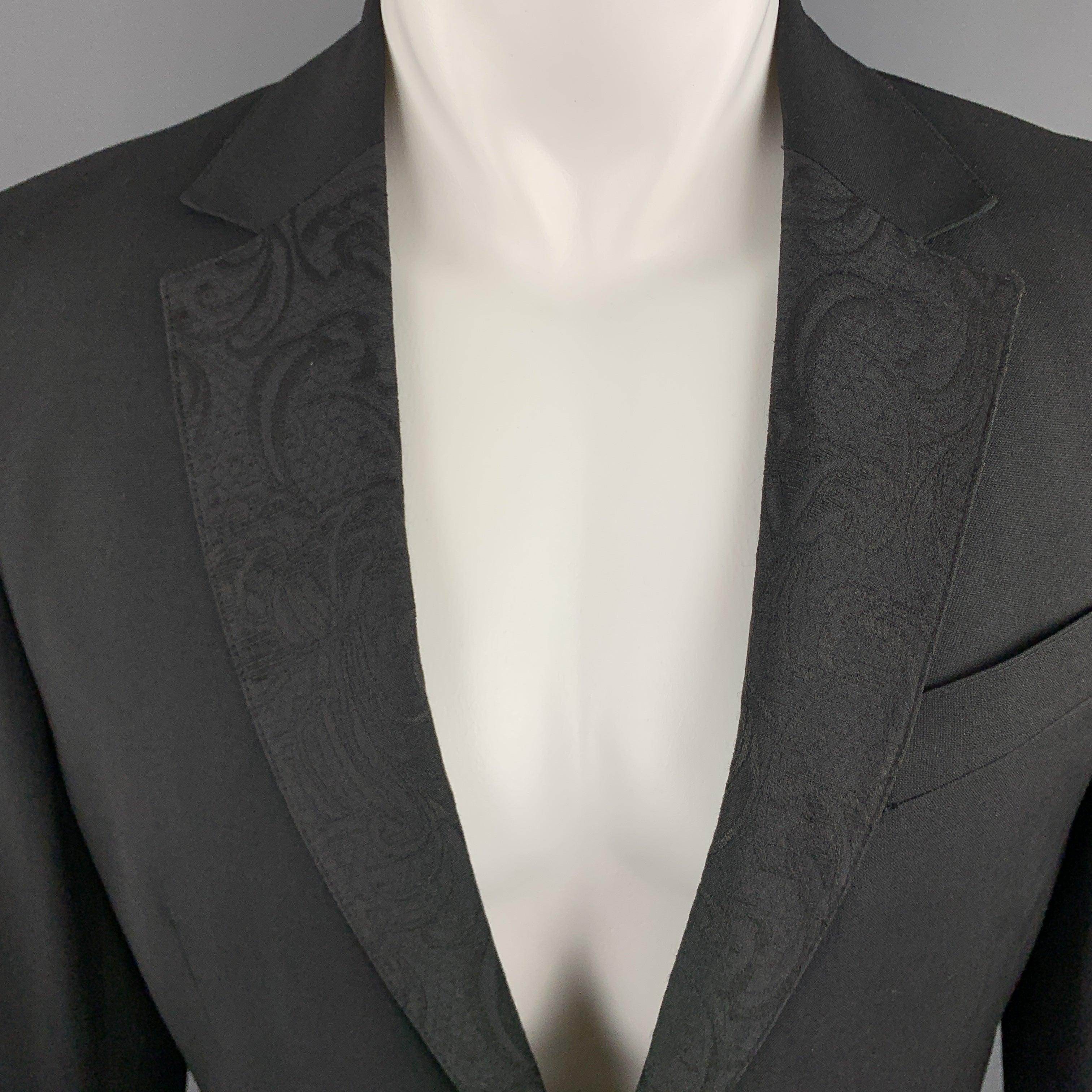 JUST CAVALLI
sport coat comes in black wool with a lace overlay notch lapel, single breasted, two button front, and brocade print satin liner. Made in Italy.Excellent Pre-Owned Condition. 

Marked:   IT 50 

Measurements: 
 
Shoulder:
17 inches