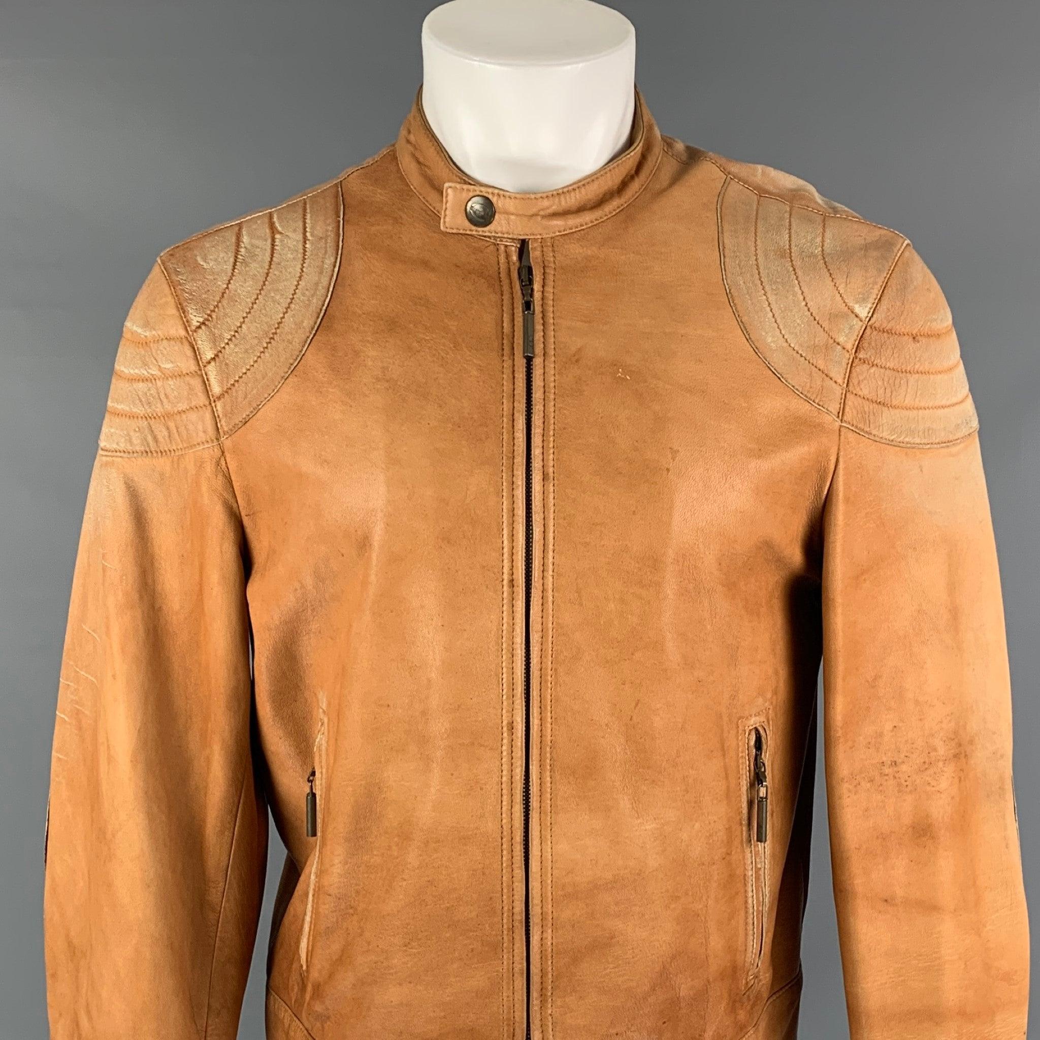 JUST CAVALLI jacket comes in a tan distressed leather featuring a biker style, elbow patches, zipper pocket,collar strap detail, and a full zip up closure.Good
Pre-Owned Condition.  

Marked:   50 

Measurements: 
 
Shoulder: 18.5 inches  Chest: 40