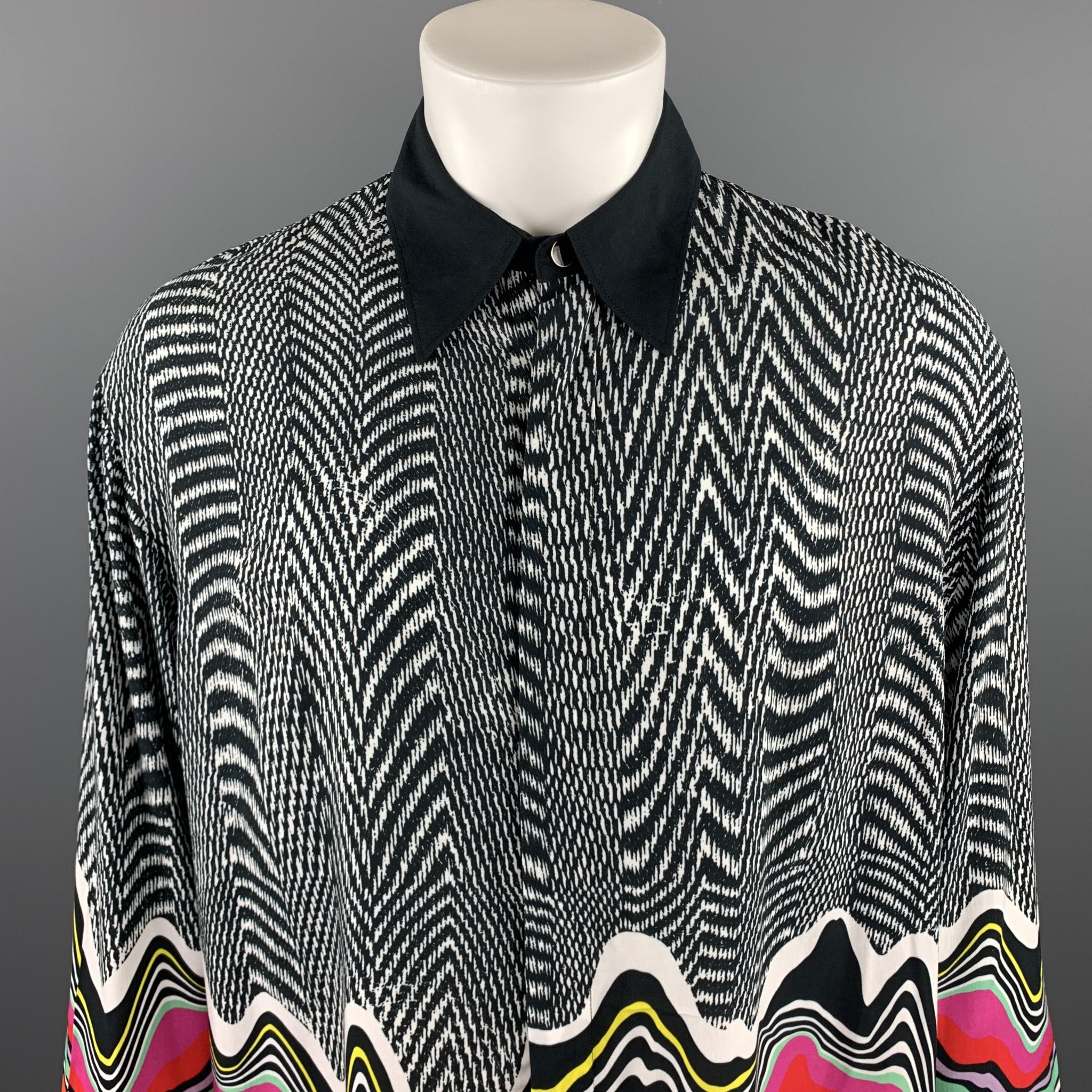 JUST CAVALLI long sleeve shirt comes in a black & white viscose with a multi-color abstract design featuring a oversized button up style, spread collar, and a hidden button closure. Made in Italy.

New With Tags. 
Marked: IT