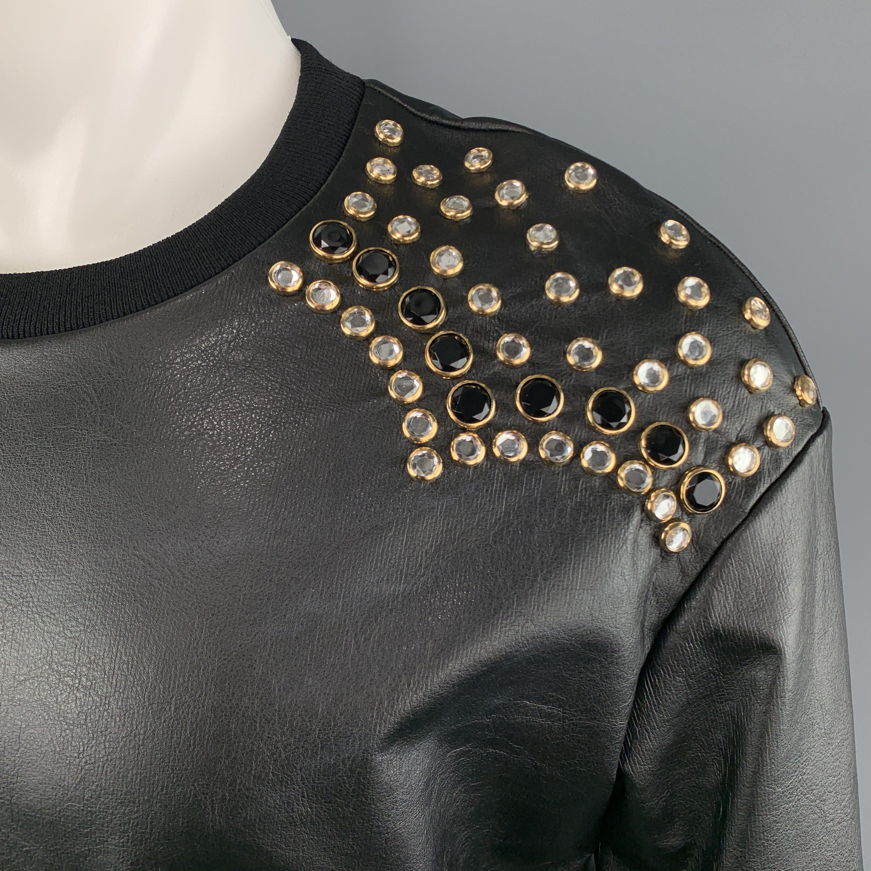 JUST CAVALLI western pullover comes in black coated leather effect cotton jersey with a ribbed crew neck and gold tone black and clear rhinestone studded shoulders. Made in Italy.
Excellent
Pre-Owned Condition. 

Marked:   IT 44 

Measurements: 
