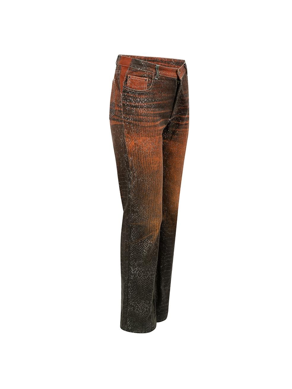 CONDITION is Good. General wear to jeans is evident. Moderate signs of discolouration to lining and fading to crotch seam on this used Just Cavalli designer resale item.



Details


Multicolour

Denim

Straight leg jeans

Snakeskin animal print