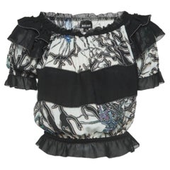 Just Cavalli Top de crepé estampado blanco/negro con volantes y hombros descubiertos M