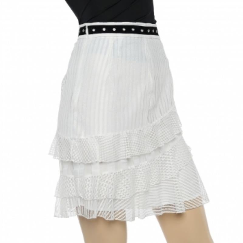 This skirt from Just Cavalli will make you look stylish! Created using white lace fabric, this skirt flaunts tiered formations with a ruffled overlay. This skirt can be fastened by a zipper. Look chic as you wear this Just Cavalli creation.
