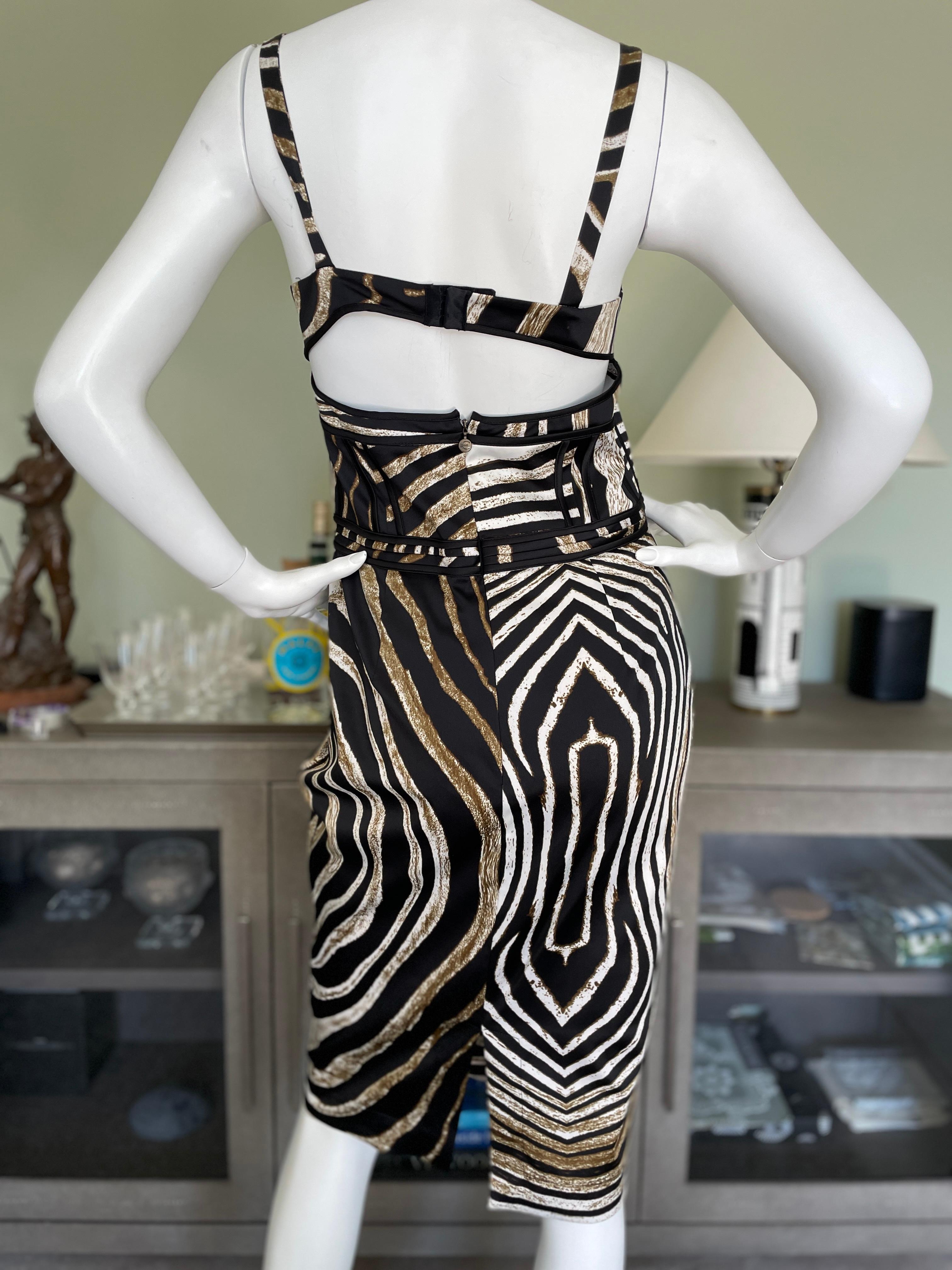 Just Cavalli Zebra Print Corset Cocktail Dress by Roberto Cavalli. 
This is so pretty, use the zoom feature to see details.
Size 44
Bust 34