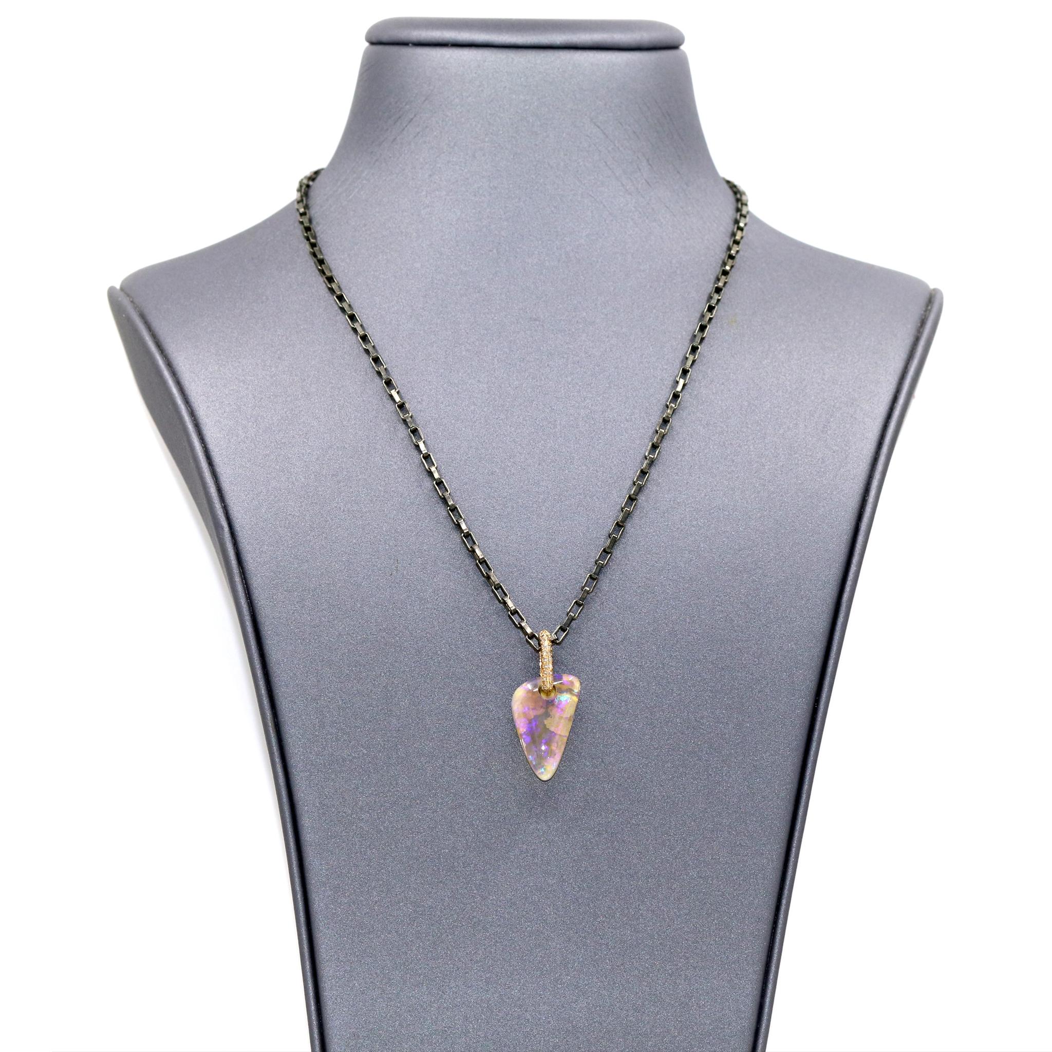 One of a Kind Floating Opal Necklace handmade by jewelry designer Julie Romanenko featuring an extraordinary and distinctive Australian crystal opal with vibrant violet, blue, and green flash. The phenomenal gem is attached to a diamond-embedded 14k