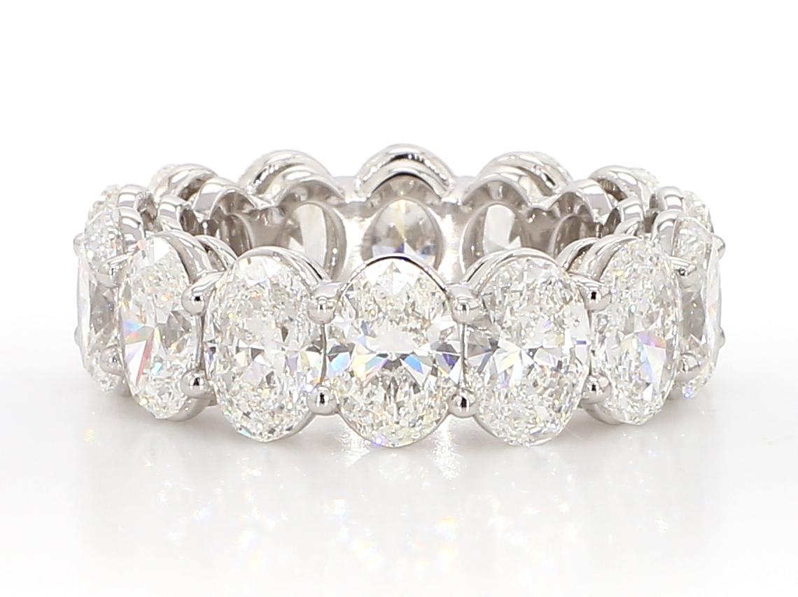 Contemporary Just Under 10 Carat Oval Cut Diamond Eternity Band Set In Platinum. For Sale