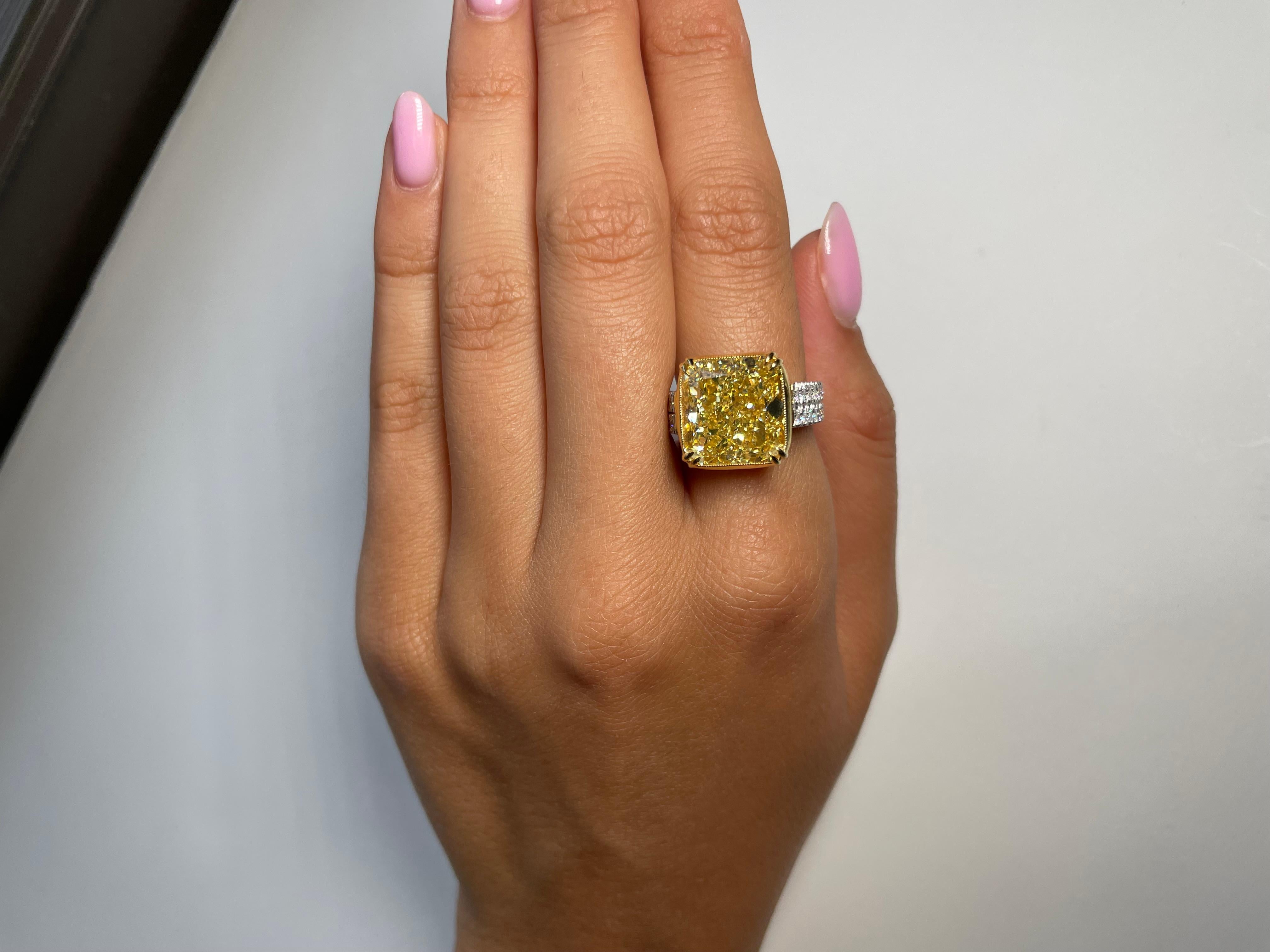 Introducing an extraordinary Contemporary-style diamond ring with a total weight of 12.82 Carats, perfect for engagements and cocktail events. Its exceptional design is sure to captivate onlookers both close and afar. Featuring a GIA Certified 11.81