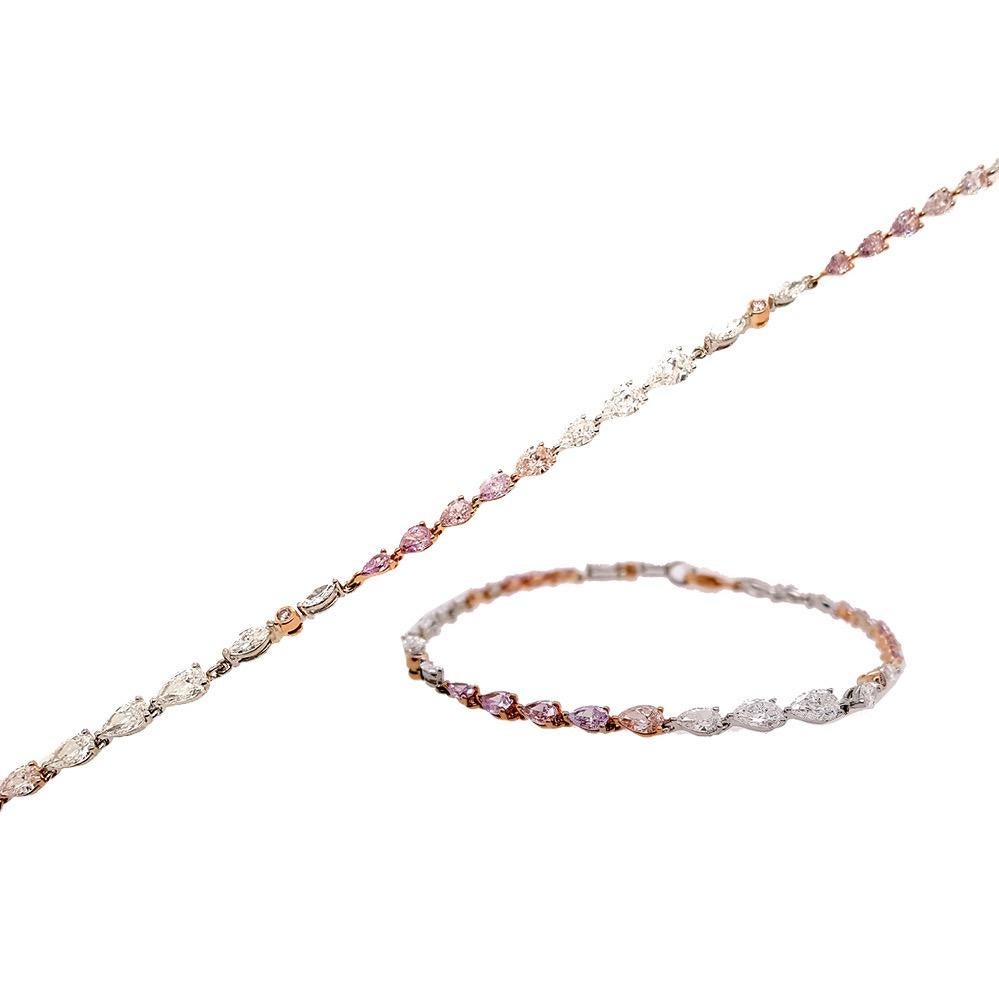 Introducing our stunning pear-shaped natural pink and white diamond tennis bracelet. This exceptional piece features 22 exquisite natural pink diamonds and white diamonds, with a total weight of 4.95 carats. A true statement piece, this bracelet is