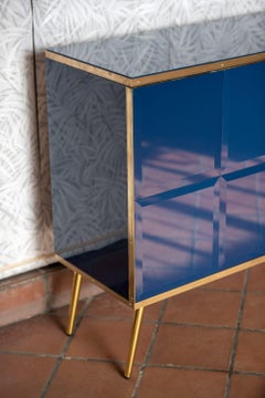 JustFurnituress sideboard: sapphire blue glass, brass frame, luxury design