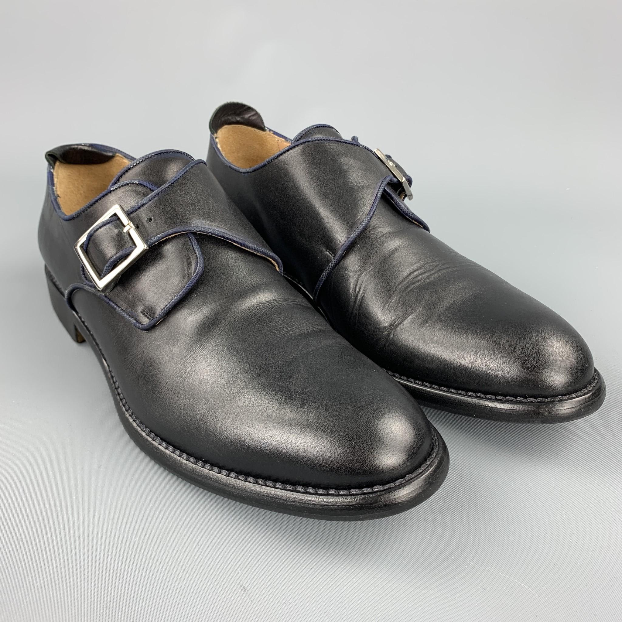 JUSTIN DEAKIN loafers comes in a black leather featuring a monk strap with a wooden heel. Made in Italy.

Excellent Pre-Owned Condition.
Marked: 10

Outsole: 

12.5 in. x 4 in. 

SKU: 103702
Category: Loafers

More Details
Brand: JUSTIN DEAKIN
Size: