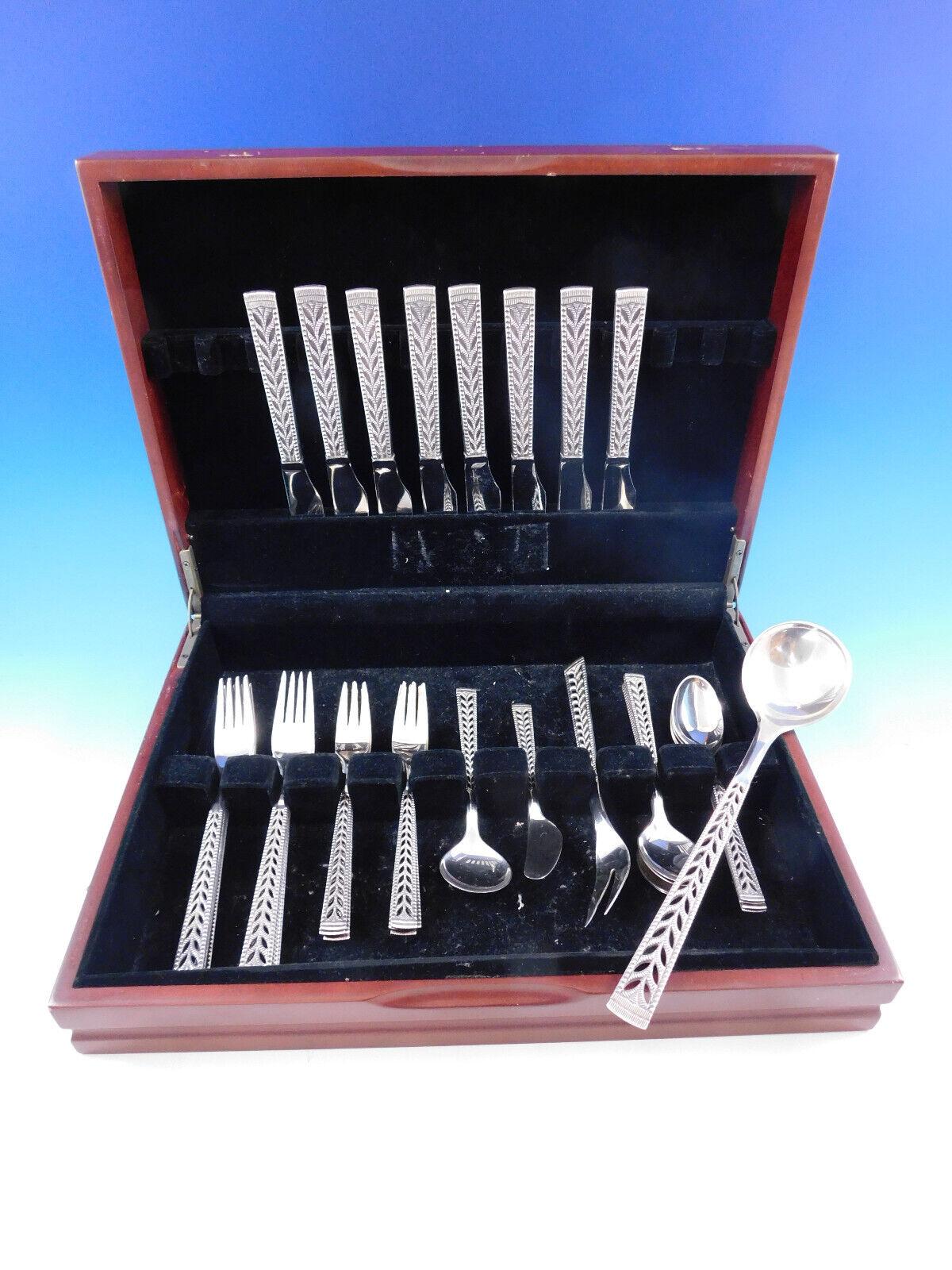 Juvel by Nils Hansen Norway Norwegian 830 silver Flatware set, circa 1965, with unique pierced handle - 36 pieces. This set includes:

8 Knives, 8
