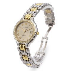 Montre Juvenia Biarritz en acier inoxydable avec lunette en or jaune 18 carats et diamants