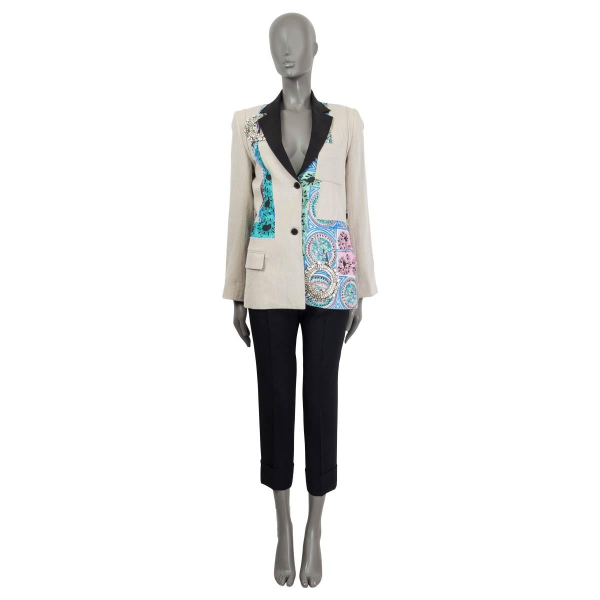 100% authentic JW Anderson Mystic Paisley blazer in beige linen (100%) with asymmetric patchwork panels in multicolor paisley. Features buttoned cuffs, a chest pocket and two flap pockets on the front. Has a detachable belt at the back and two