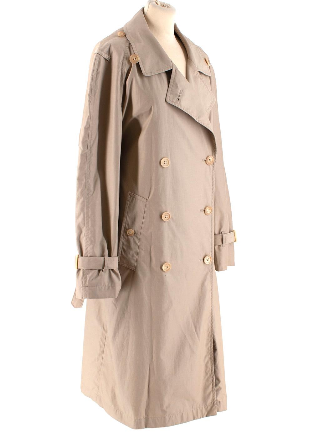 J.W. Anderson Beige Oversized Trench Coat

- Made of soft cotton canvas 
- Oversized cut 
- Strap details to the front 
- Button fasting to the front
- Double breasted cut 
- Buckled cuffs 
- Fully lined 
- Modern take on a classic style 