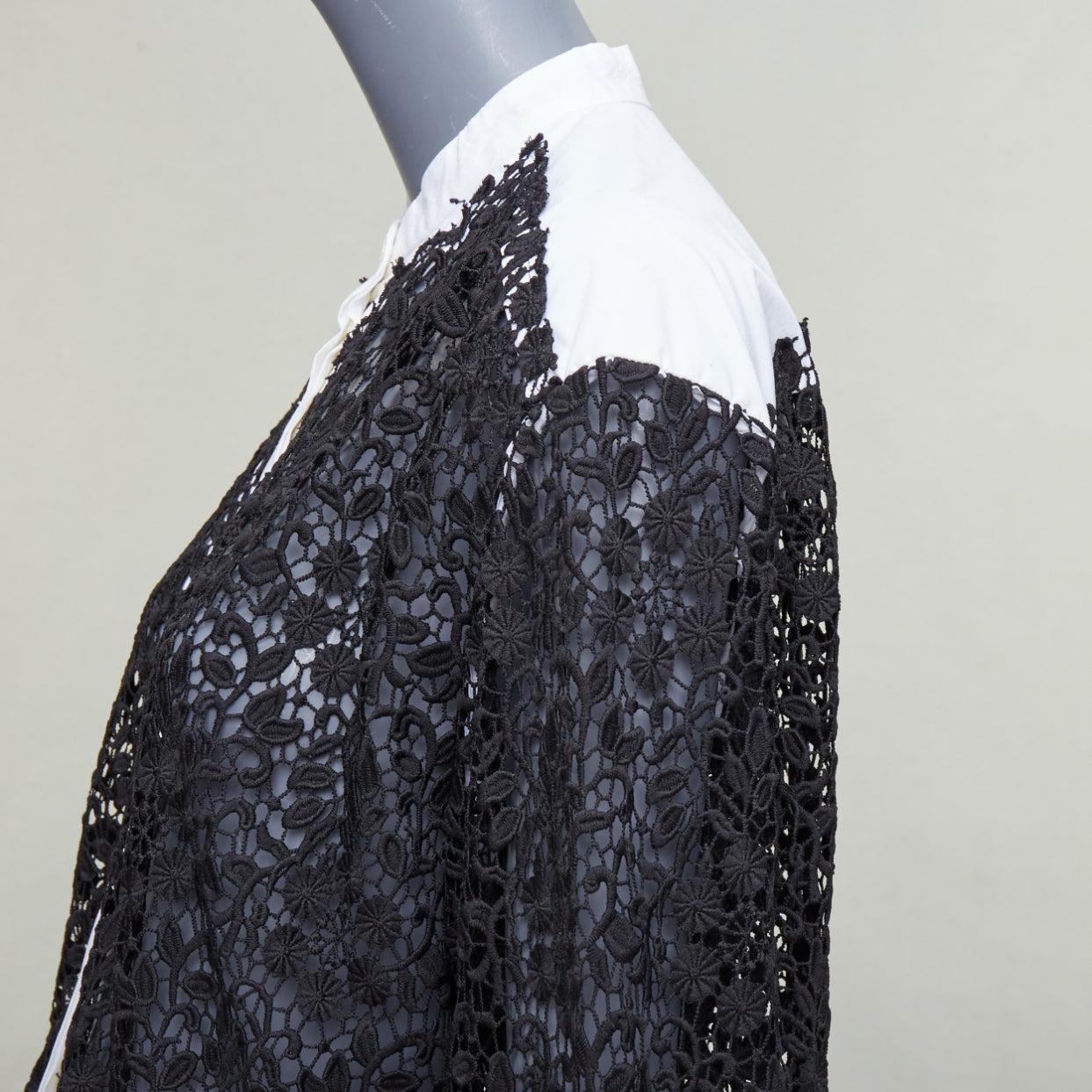 JW ANDERSON black white cotton floral lace insert dress shirt UK8 S
Reference: NKLL/A00438
Brand: JW Anderson
Designer: JW Anderson
Material: Cotton, Lace
Color: White, Black
Pattern: Lace
Closure: Button
Extra Details: This stunning shirt is