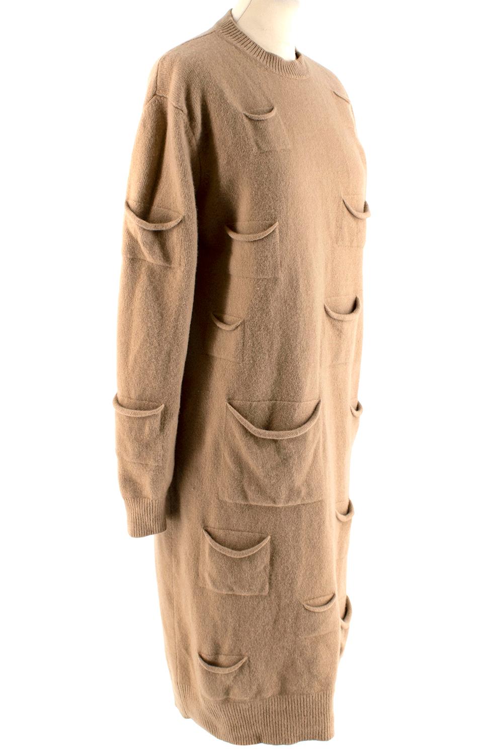 J.W. Anderson Camel Wool & Cashmere Pocket Details Knit Dress

- Made of a luxurious and soft cashmere and wool blend 
- Classic cut 
- Round neckline 
- Pockets detail throughout 
- Ribbed cuffs and hem 
- Fun comfortable design 

Materials:
90%