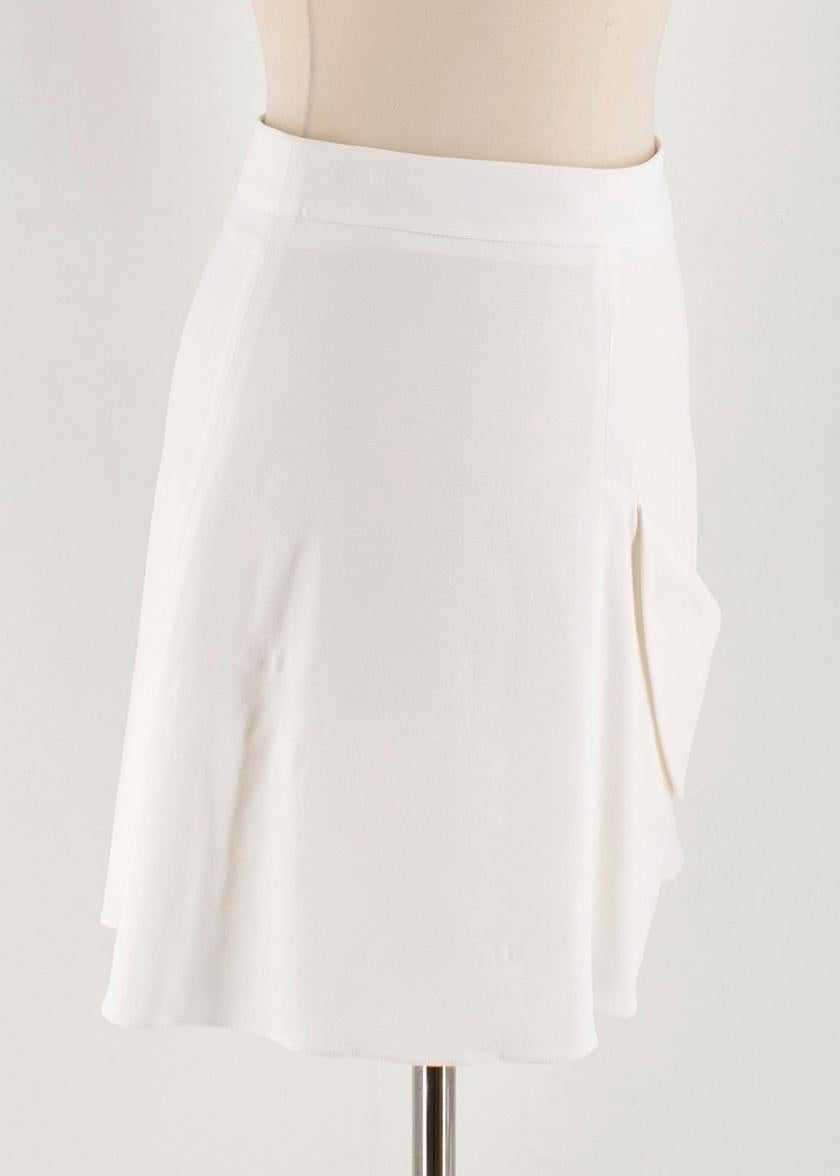 JW Anderson draped-pocket white mini A-line skirt 

- White, lightweight crepe
- High rise, A-line
- Front single draped patch pocket 
- Centre-back concealed-zip fastening
-Ivory twill lining 
- 96% viscose, 4% lyocell. 

Please note, these items