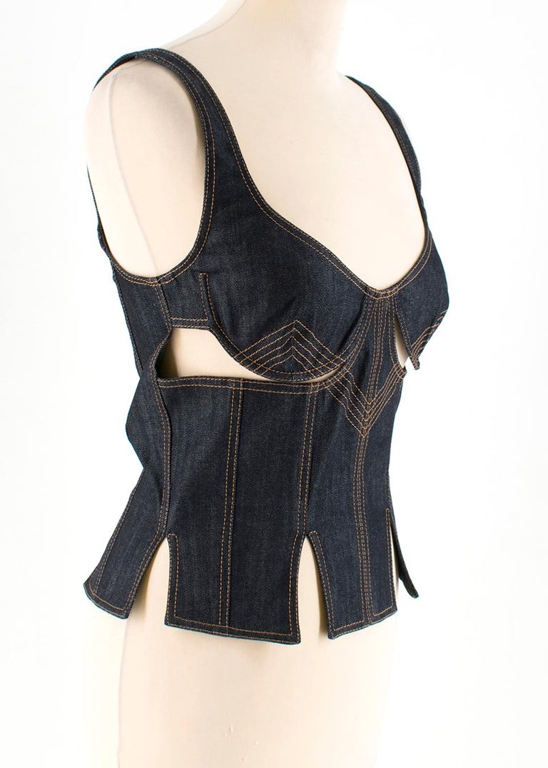 JW Anderson Stretch Denim Cut Out Bodice Top

-Dark blue bodice top
-Contrast stitching
-Cut out detailing under the bust
-Slits at the waistband
-Hook and eye closure

Please note, these items are pre-owned and may show signs of being stored even
