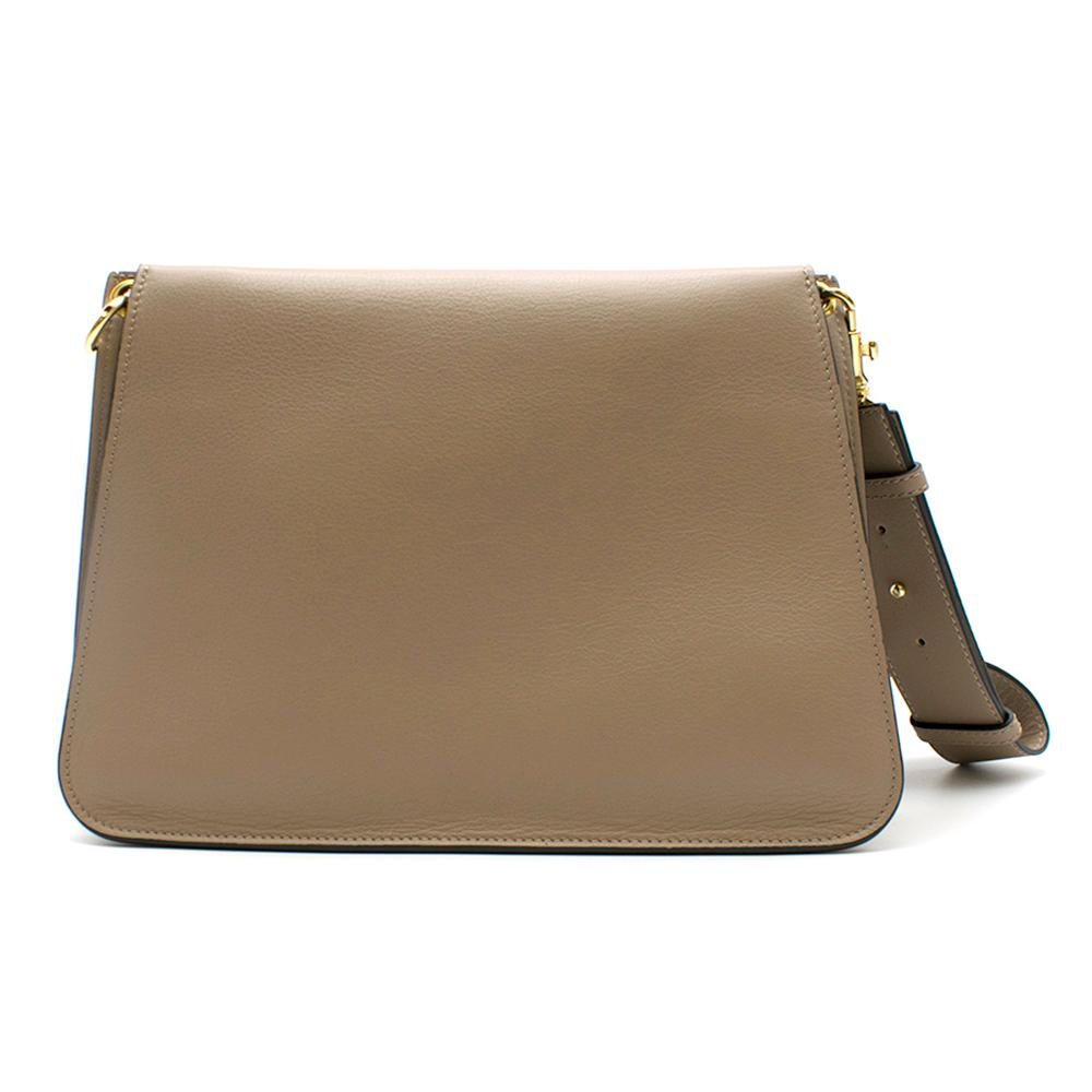 J.W. Anderson medium leather shoulder bag made of beige/gray calf leather. Features a front flap, adjustable, detachable shoulder strap and striking gold-tone hardware including the designers signature ring detailing

- Made in Spain
- Lining: 100%