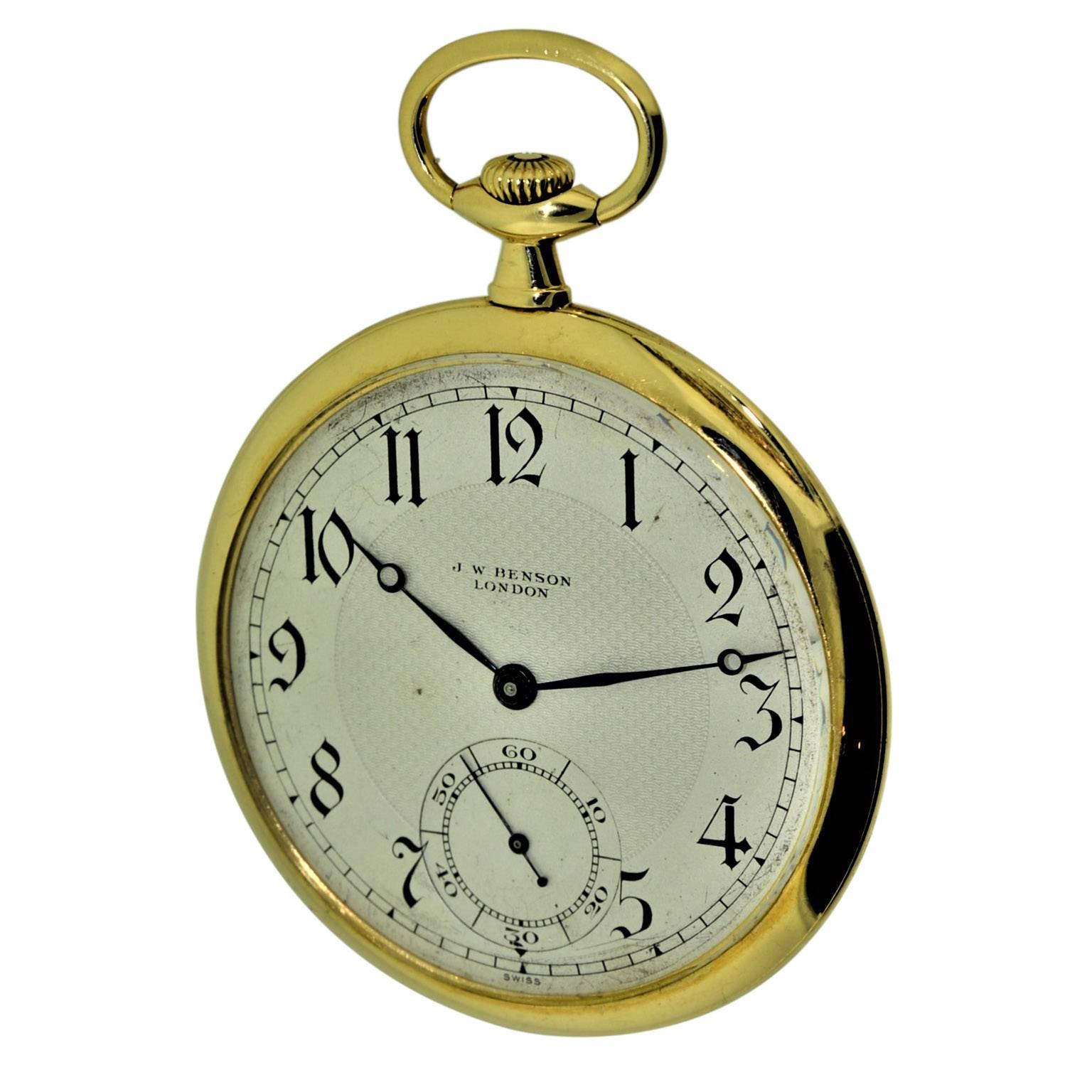 FACTORY / HOUSE: J.W. Benson 
STYLE / REFERENCE: High Grade Open Face Pocket Watch
METAL / MATERIAL: 18Kt. Yellow Gold
CIRCA: 1920's
DIMENSIONS: 48mm
MOVEMENT / CALIBER: Manual Winding / 18 Jewels 
DIAL / HANDS: Silvered with Kiln Fired Enamel