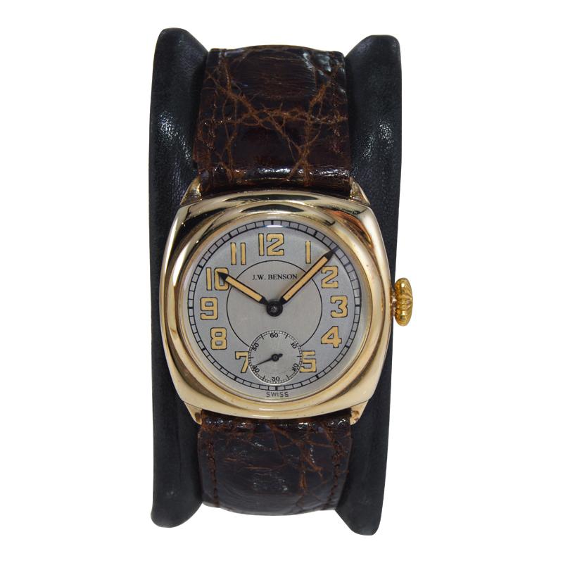 FACTORY / HOUSE: J.W. Benson London
STYLE / REFERENCE: Cushion Shape 
METAL / MATERIAL: 9Ct. Solid Gold 
CIRCA / YEAR: 1920
DIMENSIONS / SIZE: Length 33mm x Width 29mm
MOVEMENT / CALIBER: Manual Winding / 15 Jewels / Caliber 032k
DIAL / HANDS: