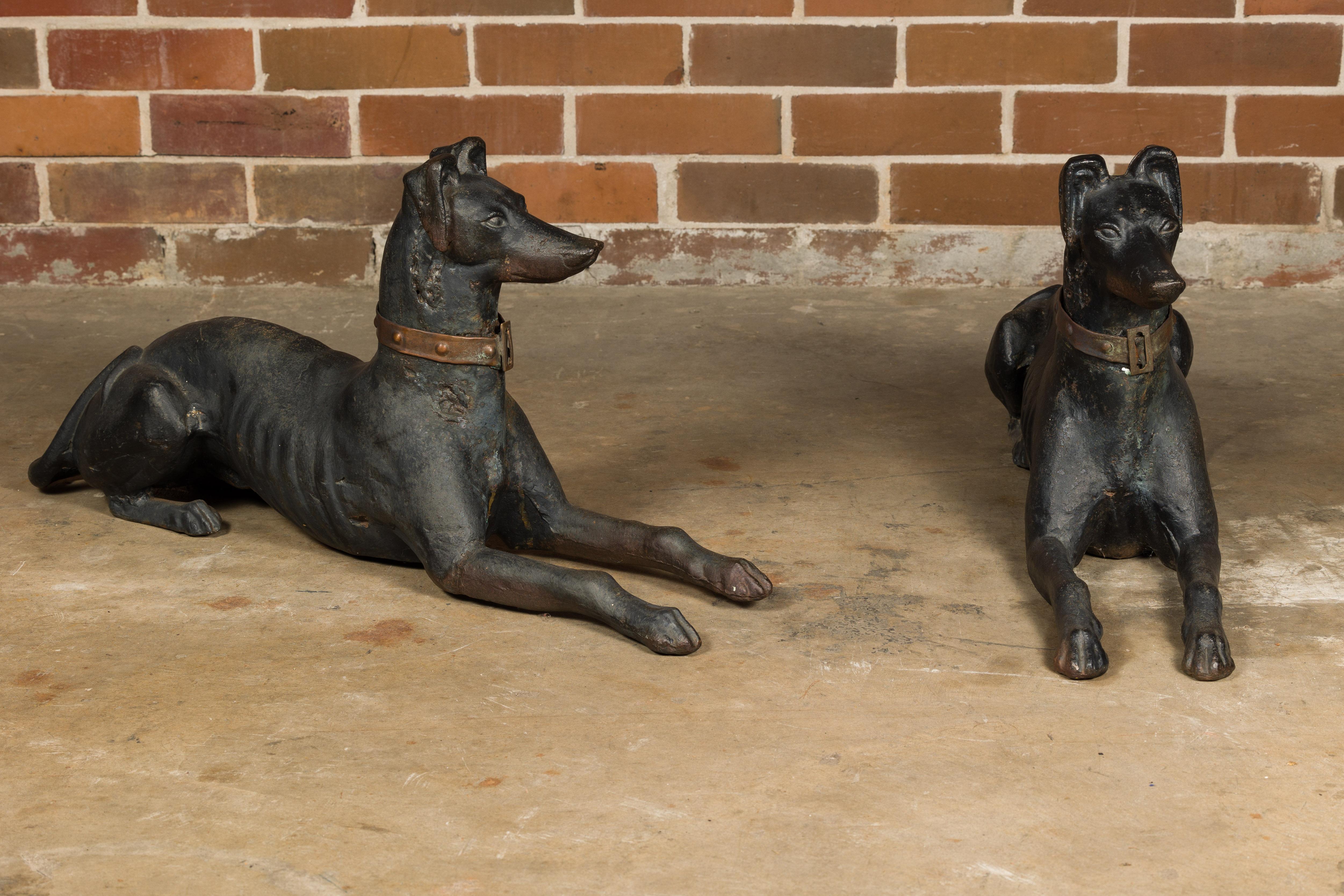 This captivating pair of American J.W Fiske iron greyhound dog sculptures from the late 19th century embodies both the elegance and regal nature of these majestic animals. Crafted with meticulous attention to detail, these sculptures present the
