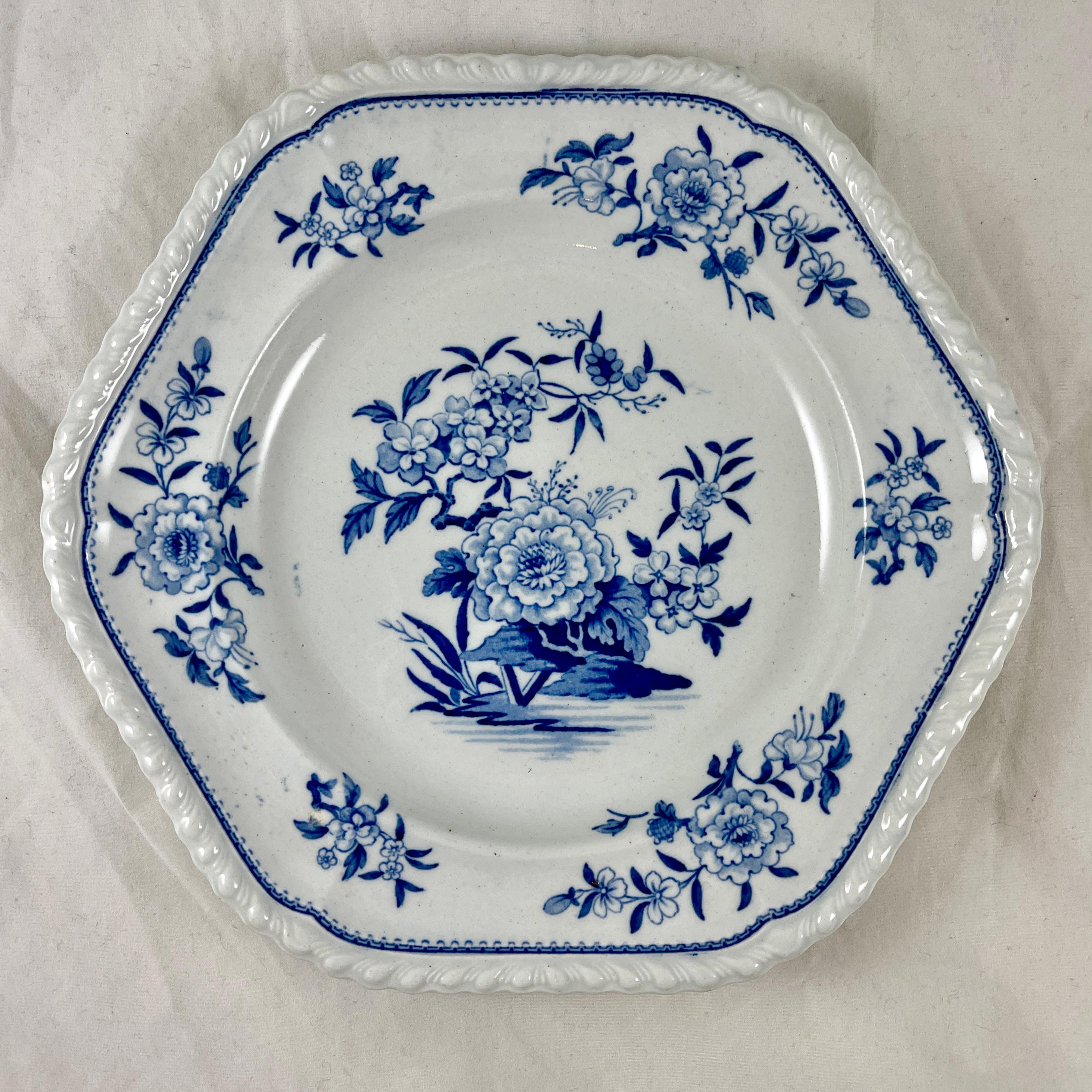 From John & William Ridgway, of Shelton, Hanley, Staffordshire, England, a set of six Hexagonal ironstone luncheon plates, circa 1820.

Ridgway operated from 1813-1830 in Hanley, this is pattern No. 1193.

Showing an underglaze tissue, transfer