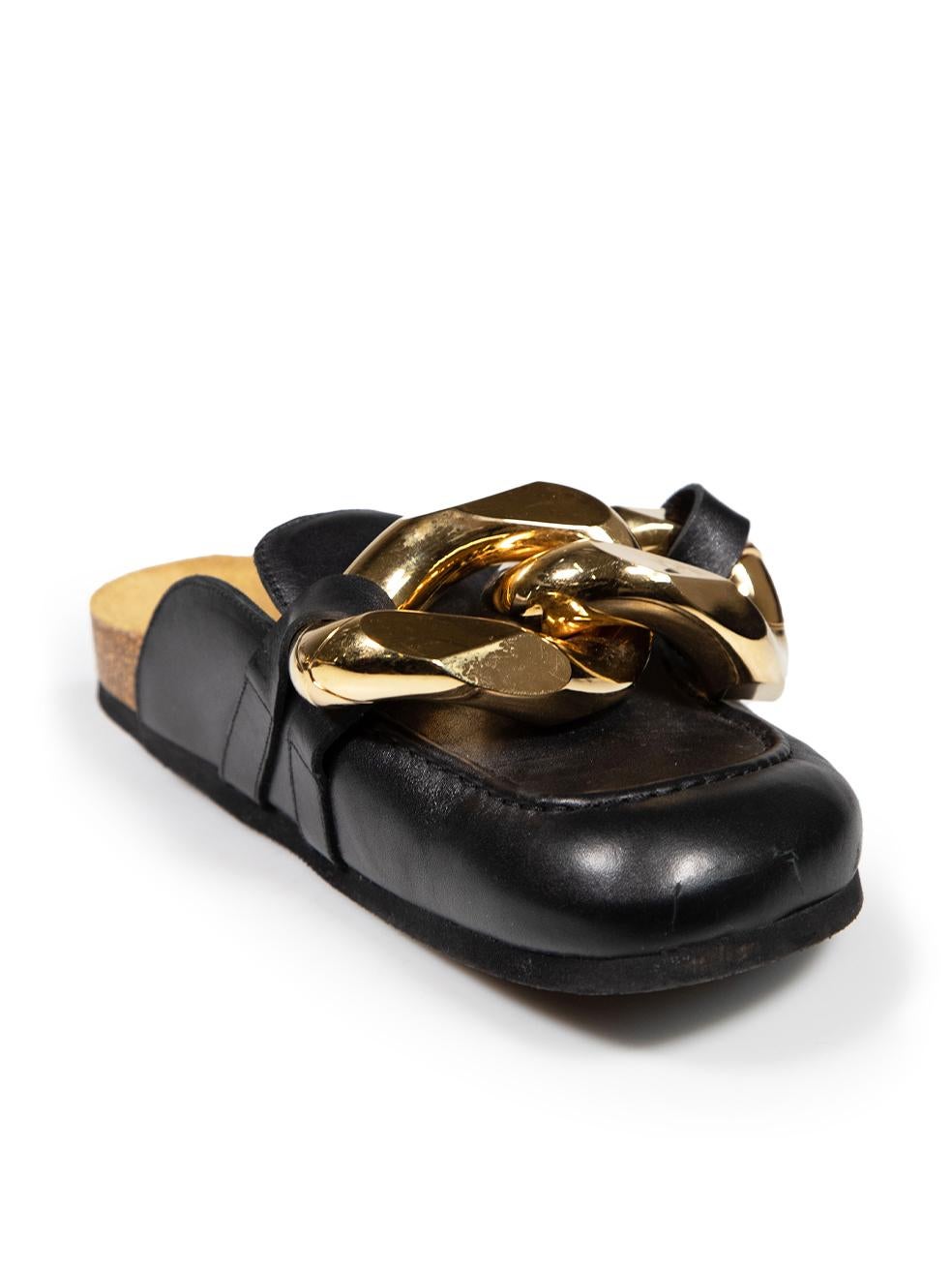 CONDITION is Good. Minor wear to mules is evident. Light scratches to tip of both shoes on this used J.W.Anderson designer resale item.
 
 
 
 Details
 
 
 Black
 
 Leather
 
 Mules
 
 Flat
 
 Oversized gold chain detail
 
 Round toe
 
 
 
 
 
 Made