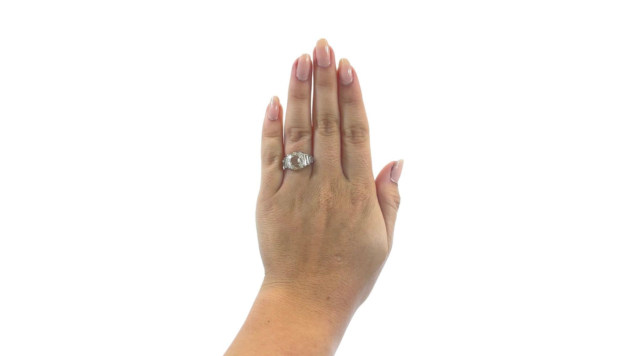 Jack Weir and Sons GIA Antique Cushion Cut Diamond Platinum Engagement Ring. The ring features a GIA 2.82 carat antique cushion cut diamond, I color, VS1 clarity (#6381402098). 6 baguettes, 4 RBC 0.77ct. Circa 2021. Size 7 1/4 and can be