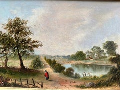 19th century English Landscape with figure on pathway with Castle and pond.