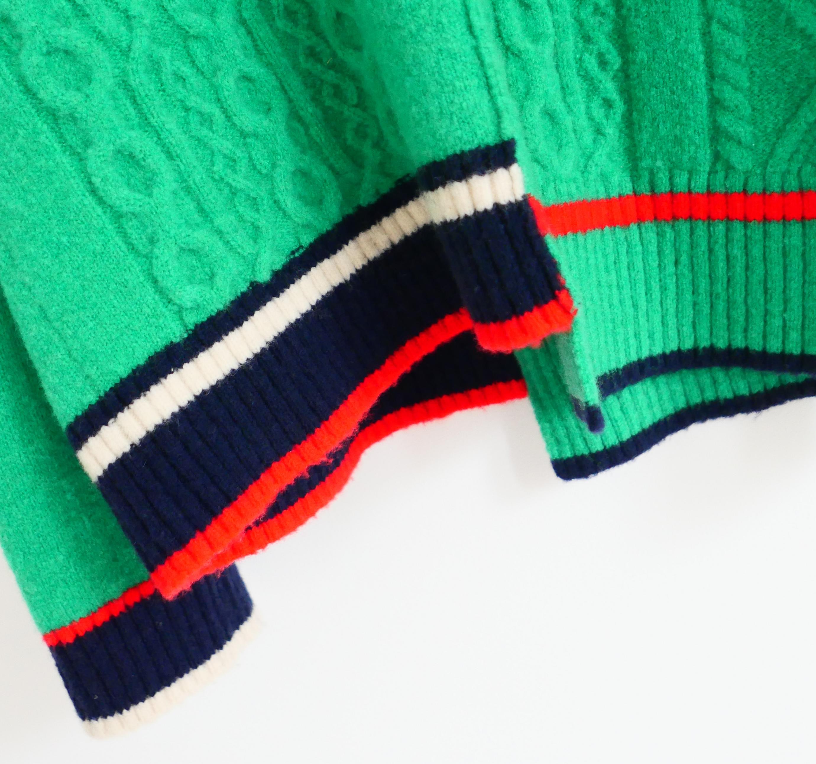 Super cool J.Won deconstructed cricket jumper - bought for £350 and worn once.  Made from super soft, thick emerald green cable knit cashmere mix with navy and red trims.Has asymmetric hem and wide v neck. One size. Measures approx - bust 42”,