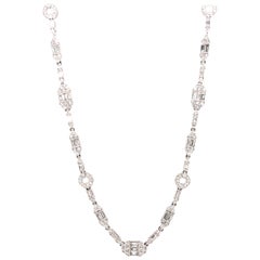 Jye’s White Gold Necklace of Baguette and Round Diamonds