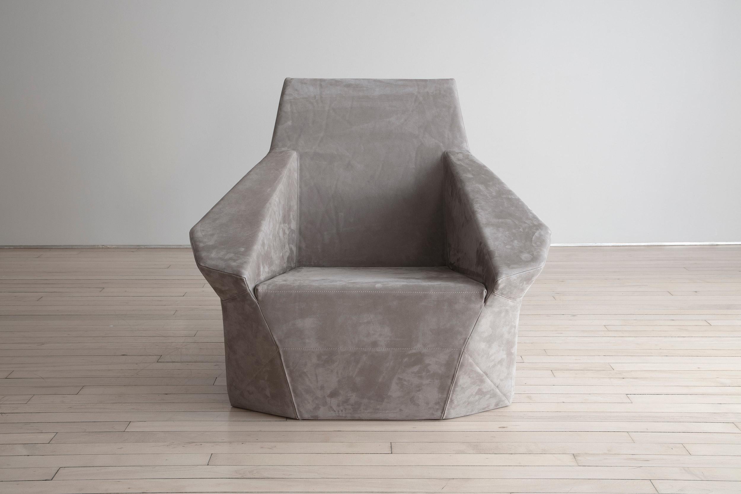 Argentinian designer, Pablo Reinoso draws a sculptural armchair and ottoman set for Domeau & Pe´re`s with the challenge to come up with the lightest piece possible while maintaining great structural efficiency and the integrity of the design.

The