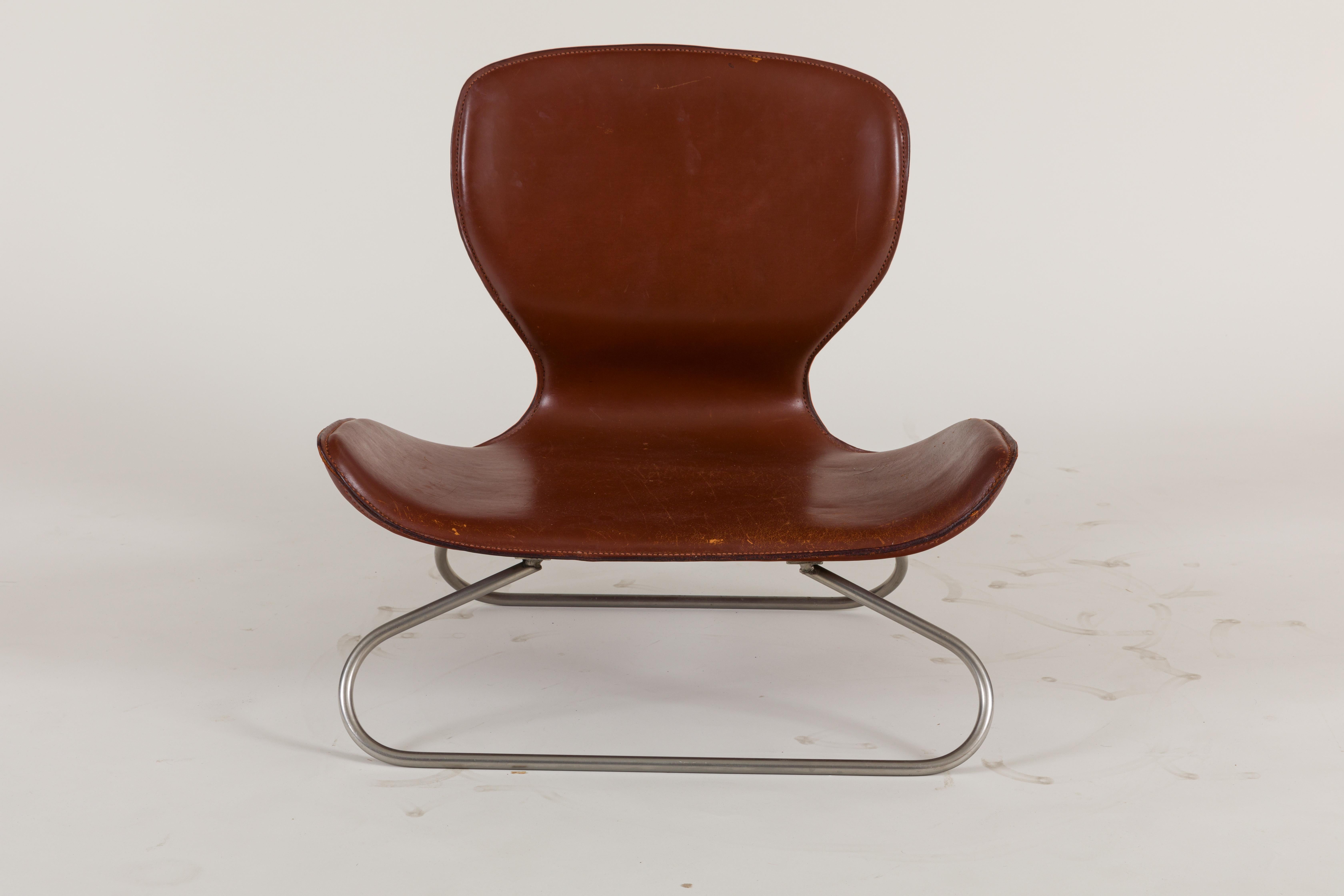 The English company, KOI, produces some of the most interesting and beautifully proportioned chairs. Each piece is hand made from tanned saddle leather which is skillfully hand-stitched in Italy before being attached to the nickel base. An unusual